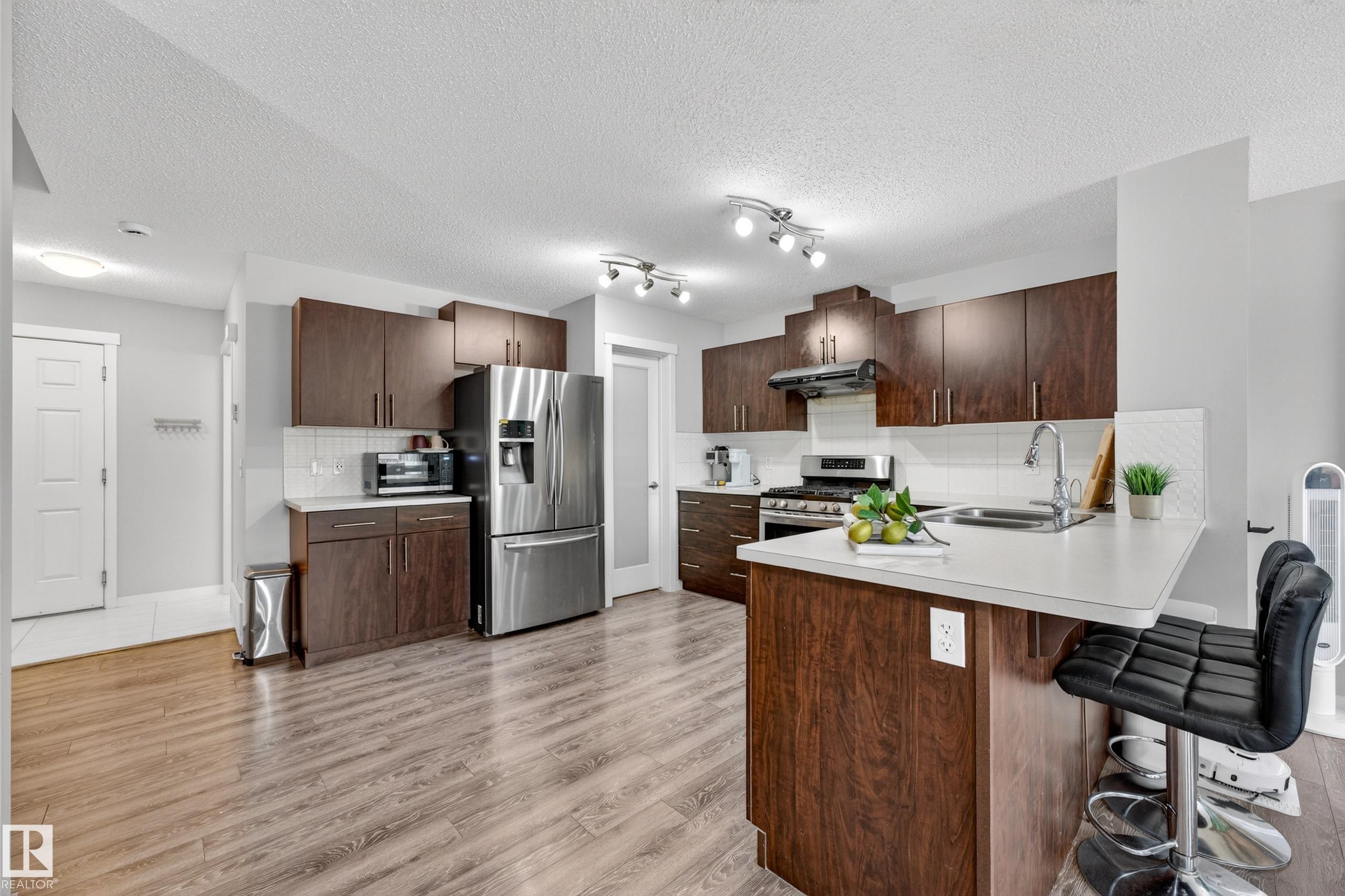 4371 Annett Common, Edmonton, AB - Indoor Photo Showing Kitchen With Double Sink