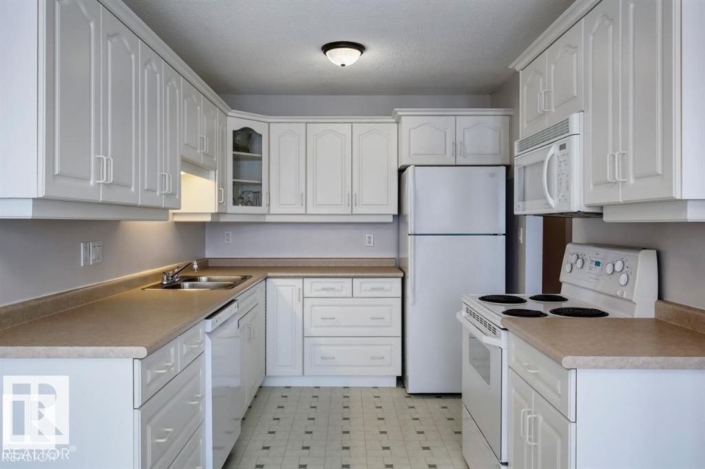 10688 Beaumaris Road, Edmonton, AB - Indoor Photo Showing Kitchen With Double Sink