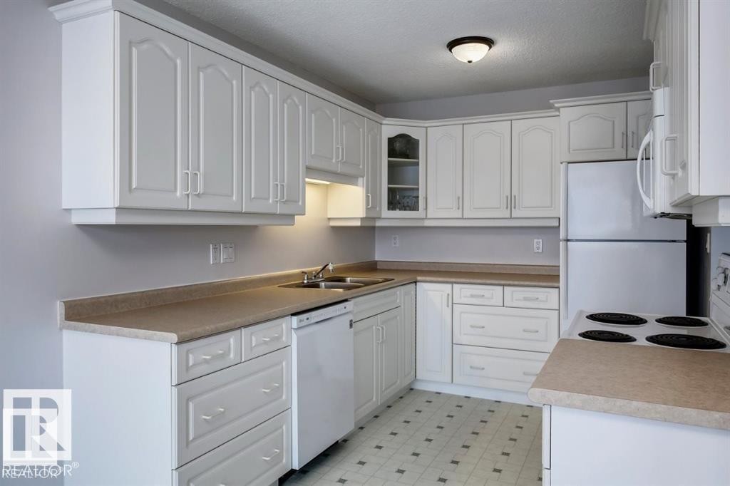 10688 Beaumaris Road, Edmonton, AB - Indoor Photo Showing Kitchen With Double Sink