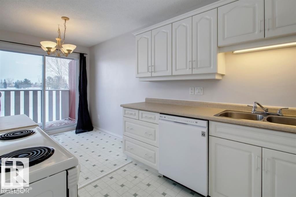 10688 Beaumaris Road, Edmonton, AB - Indoor Photo Showing Kitchen With Double Sink