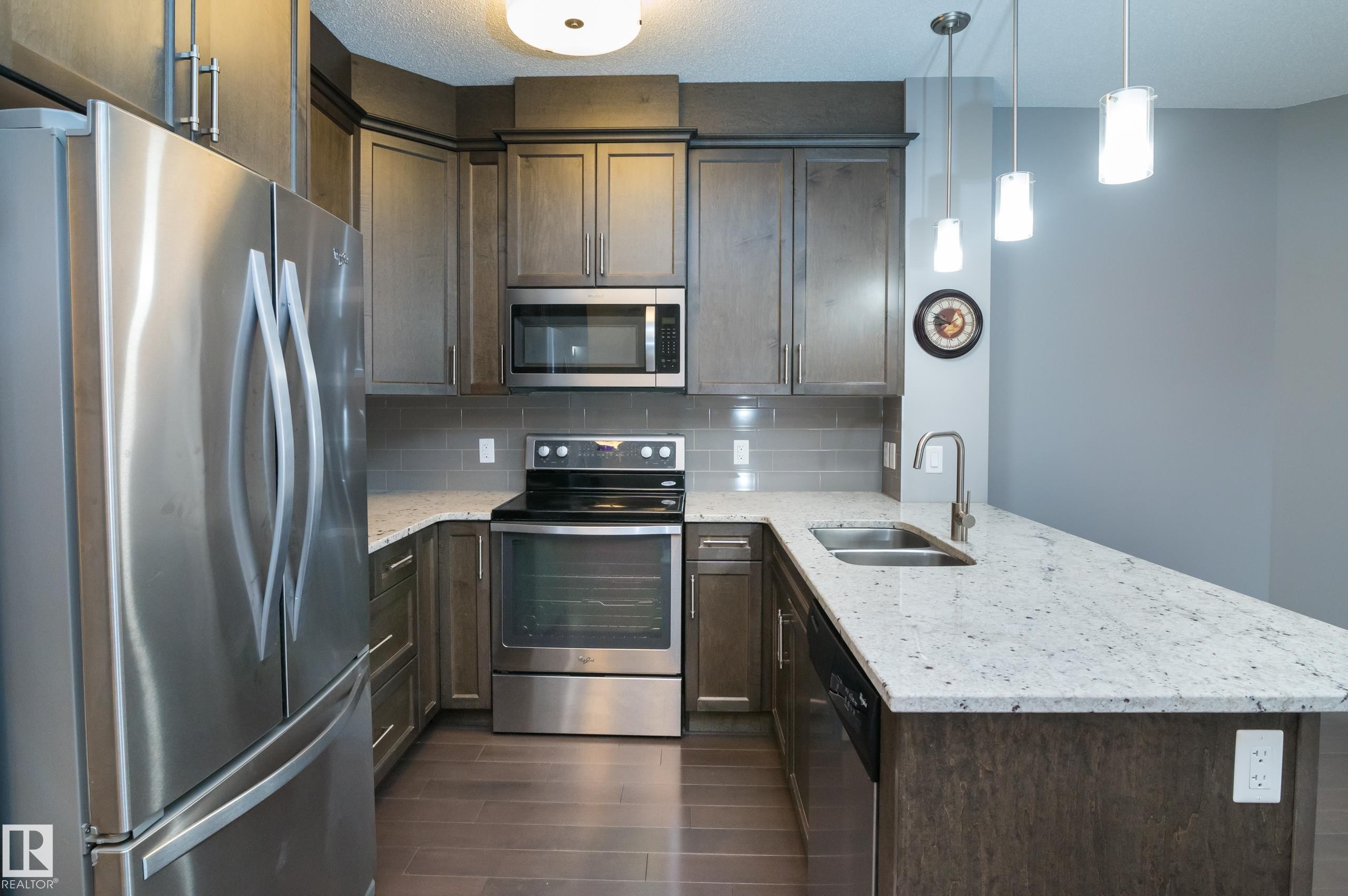 414 2207 44 Avenue, Edmonton, AB - Indoor Photo Showing Kitchen With Stainless Steel Kitchen With Double Sink With Upgraded Kitchen