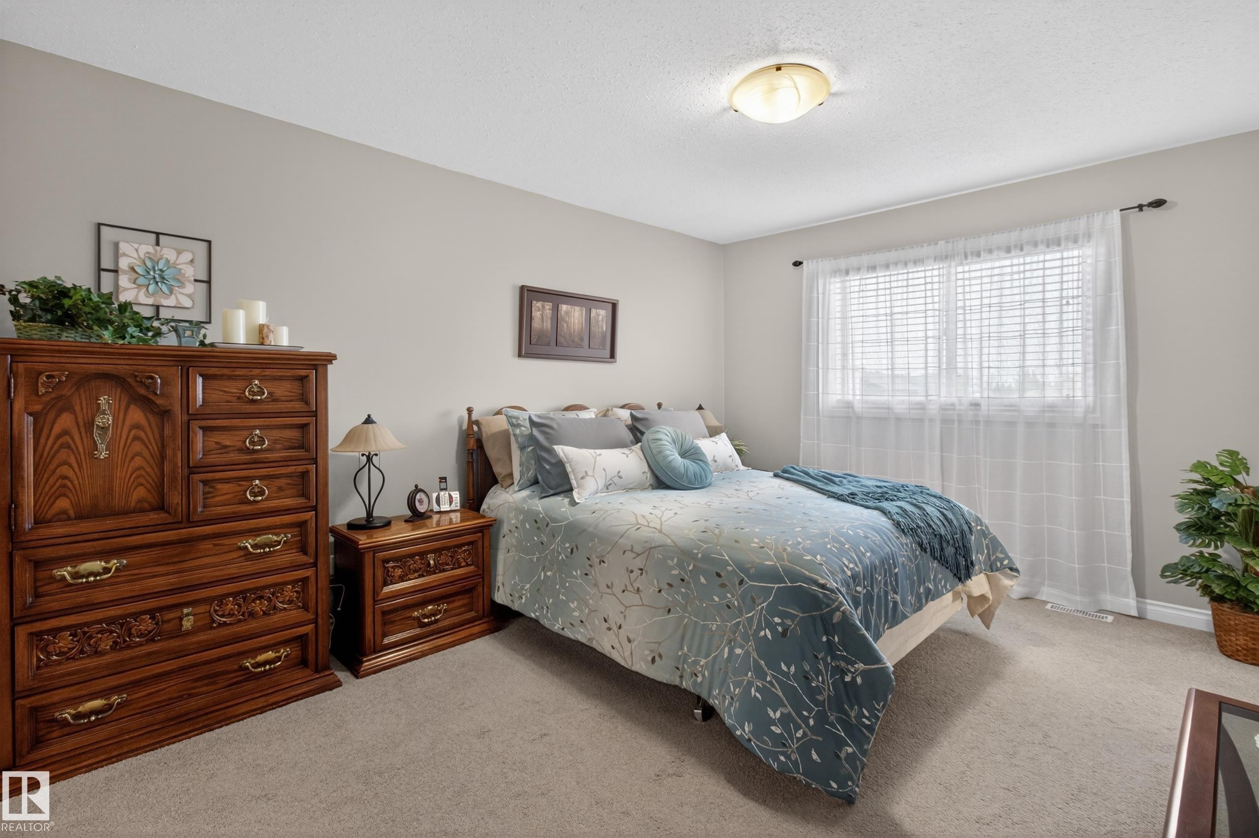 21 Beaverhill View Cr, Tofield, AB - Indoor Photo Showing Bedroom