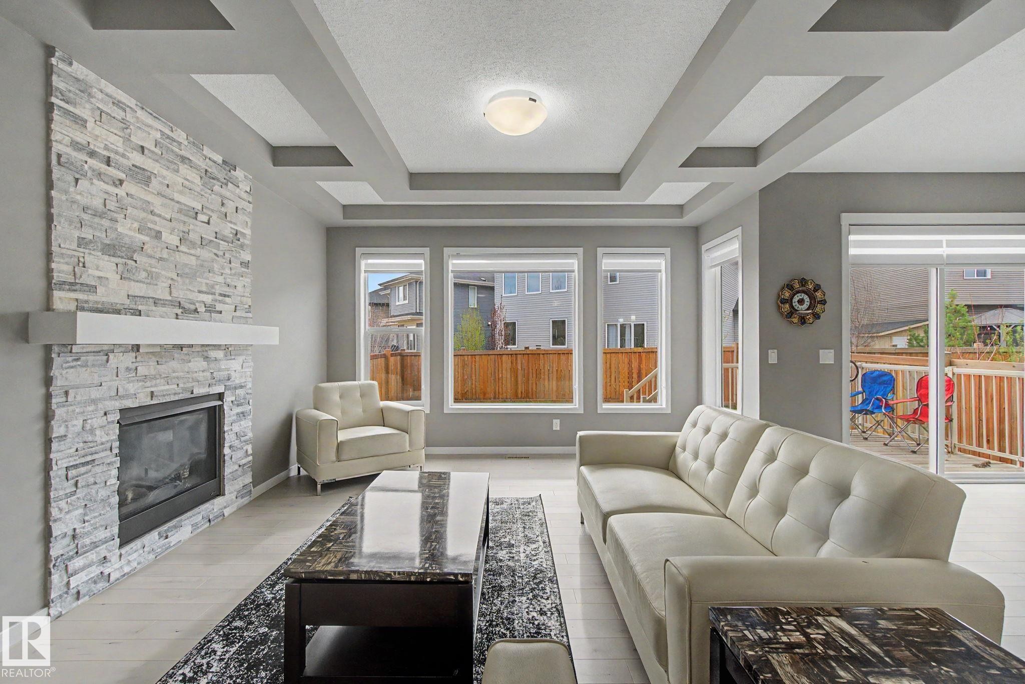 2233 56 Street Sw, Edmonton, AB - Indoor Photo Showing Living Room With Fireplace