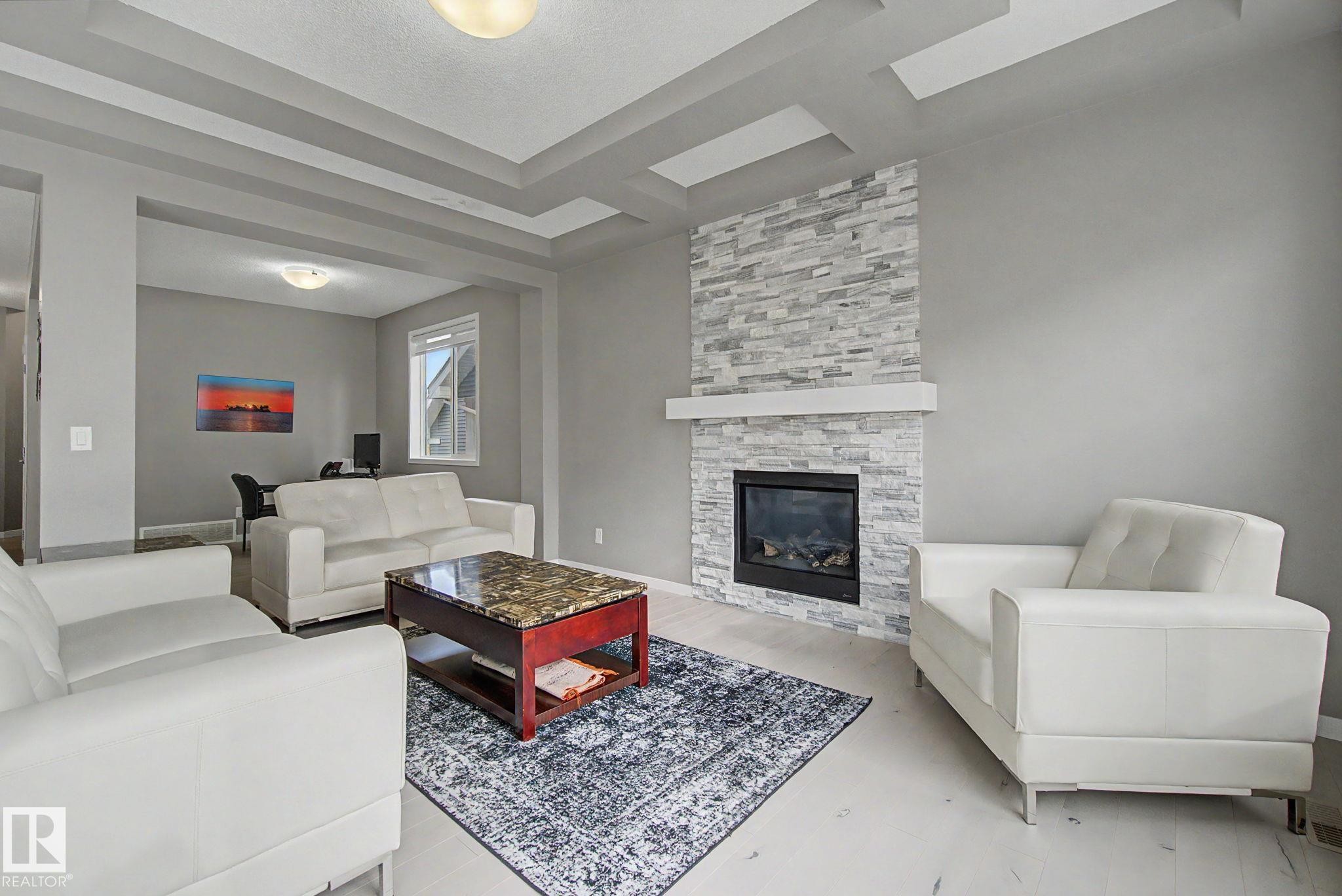 2233 56 Street Sw, Edmonton, AB - Indoor Photo Showing Living Room With Fireplace