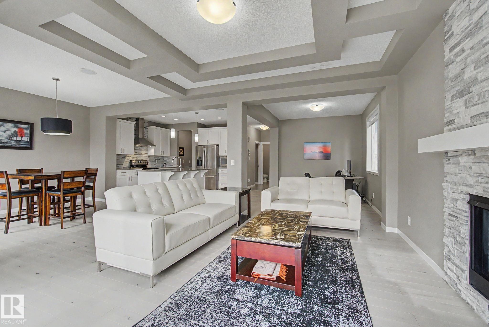 2233 56 Street Sw, Edmonton, AB - Indoor Photo Showing Living Room With Fireplace