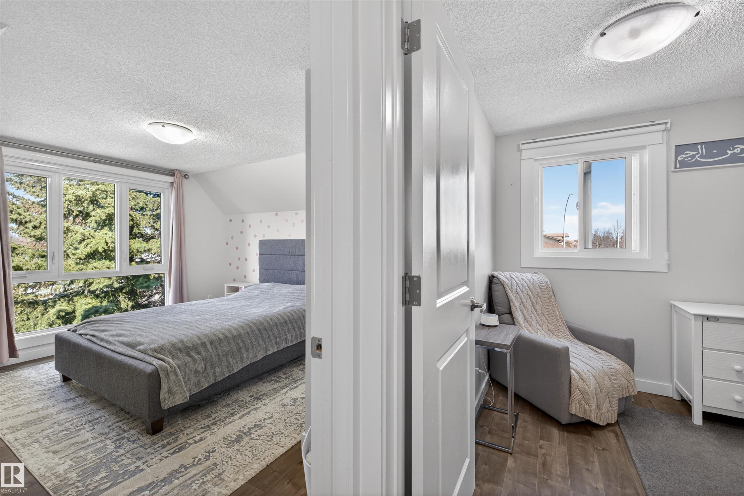 Two distinct rooms featuring individual windows with natural light, wood-finish flooring, and white trim - 15251 88A Street, Edmonton, AB - Indoor Photo Showing Bedroom