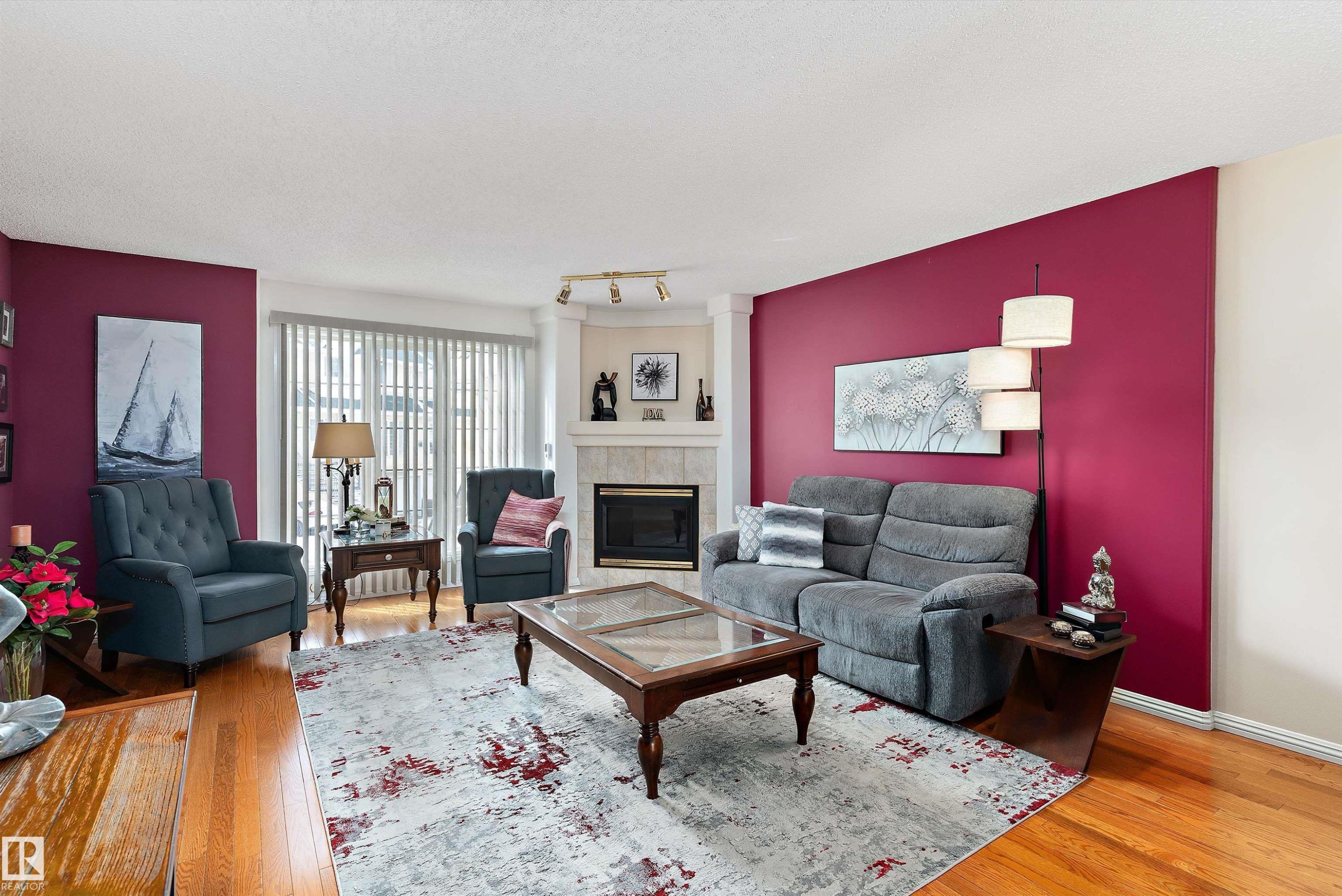 26 2419 133 Avenue, Edmonton, AB - Indoor Photo Showing Living Room With Fireplace
