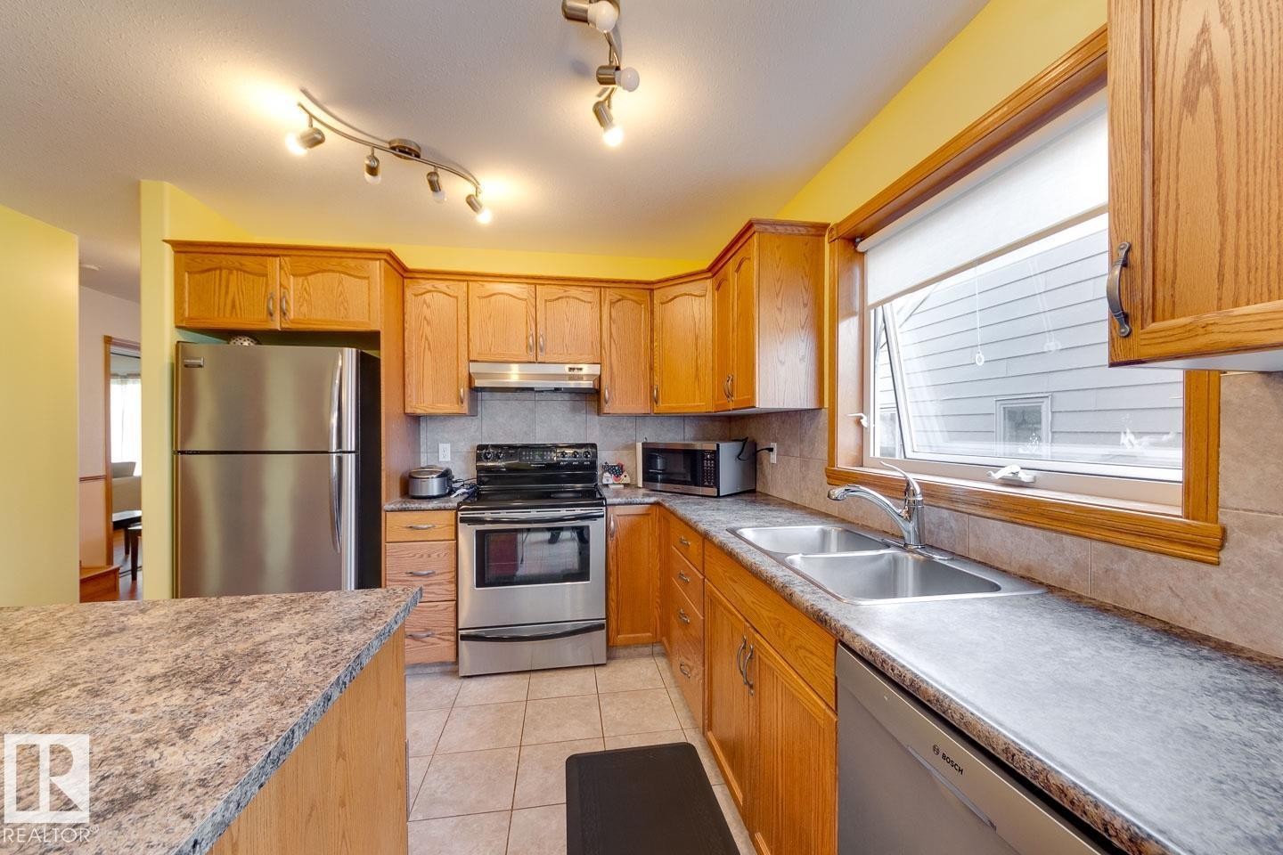 10816 67 Avenue, Edmonton, AB - Indoor Photo Showing Kitchen With Double Sink