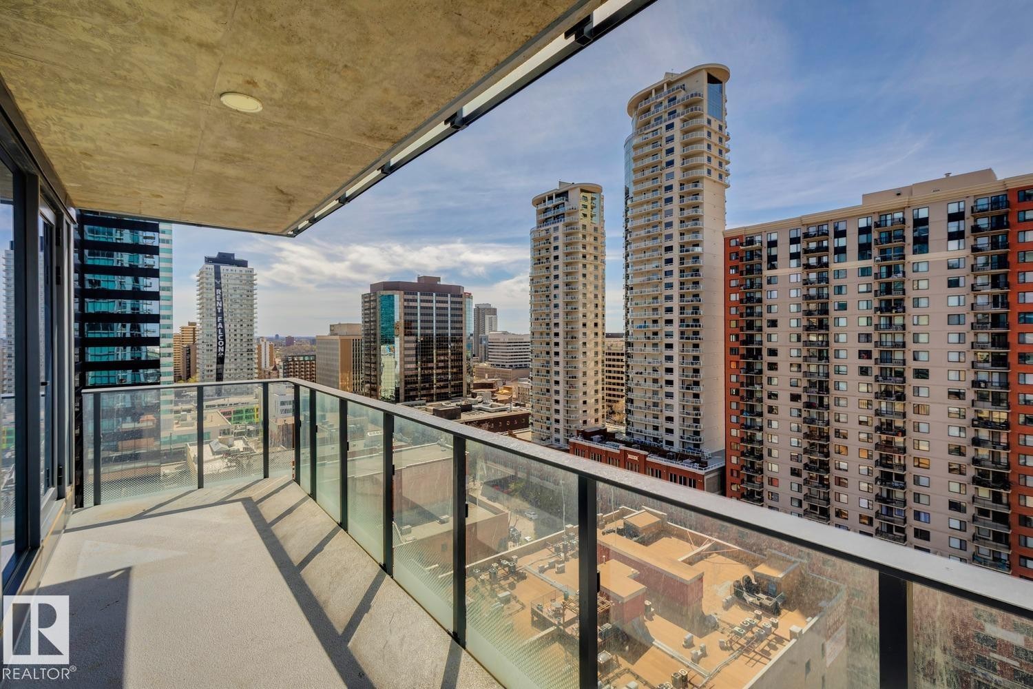 Outdoor balcony featuring a concrete floor and a glass railing - #1601 10180 103 St Nw, Edmonton, AB - Outdoor With Balcony With View