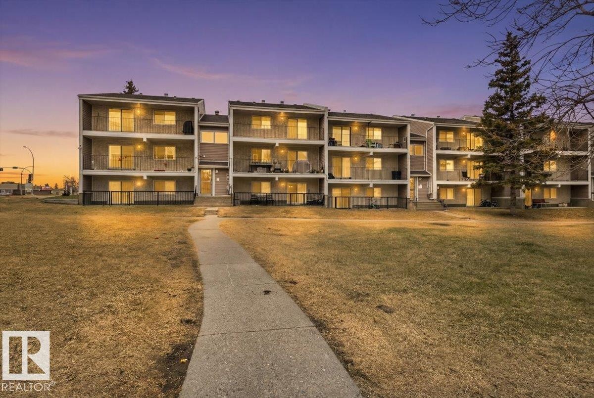 Multi-story residential building featuring individual balconies and patios - 6 3803 76 Street, Edmonton, AB - Outdoor With Balcony