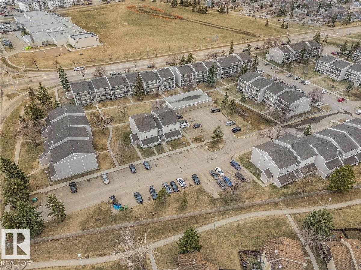 Aerial perspective showcasing a multi-building residential complex - 6 3803 76 Street, Edmonton, AB -