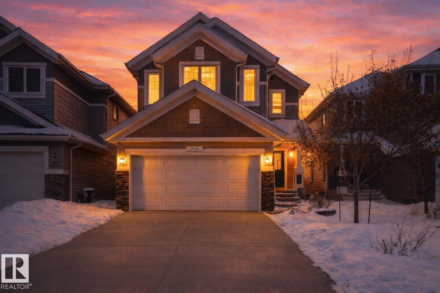 Craftsman house with stone siding and driveway - 1915 77 Street, Edmonton, AB - Outdoor