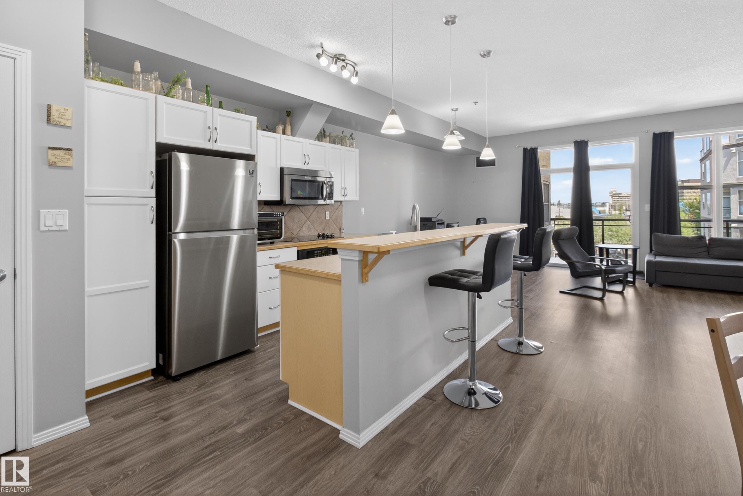 #341 4827 104A St Nw, Edmonton, AB - Indoor Photo Showing Kitchen With Stainless Steel Kitchen