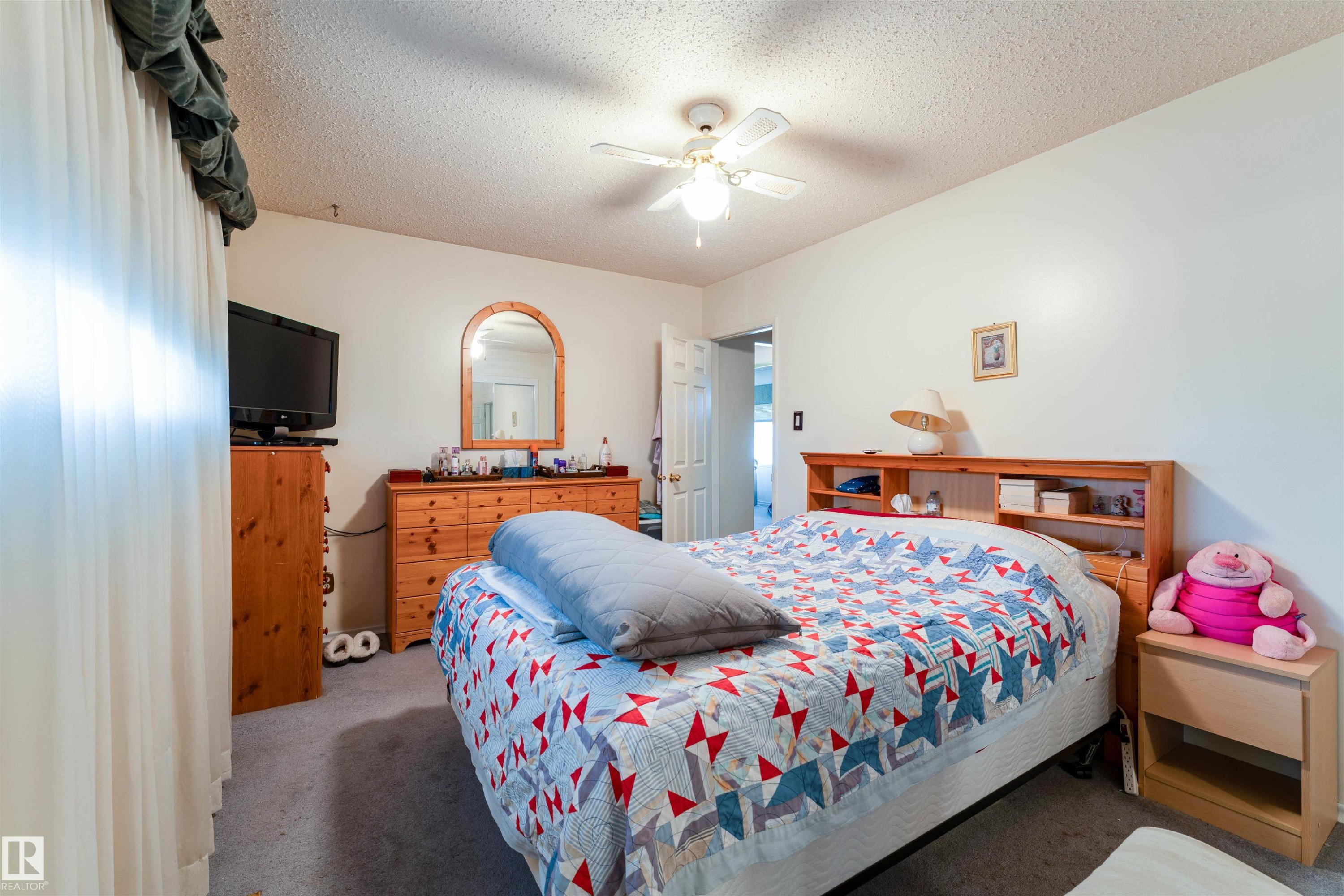 Bedroom featuring carpeted flooring and white walls - 13231 74 Street, Edmonton, AB - Indoor Photo Showing Bedroom