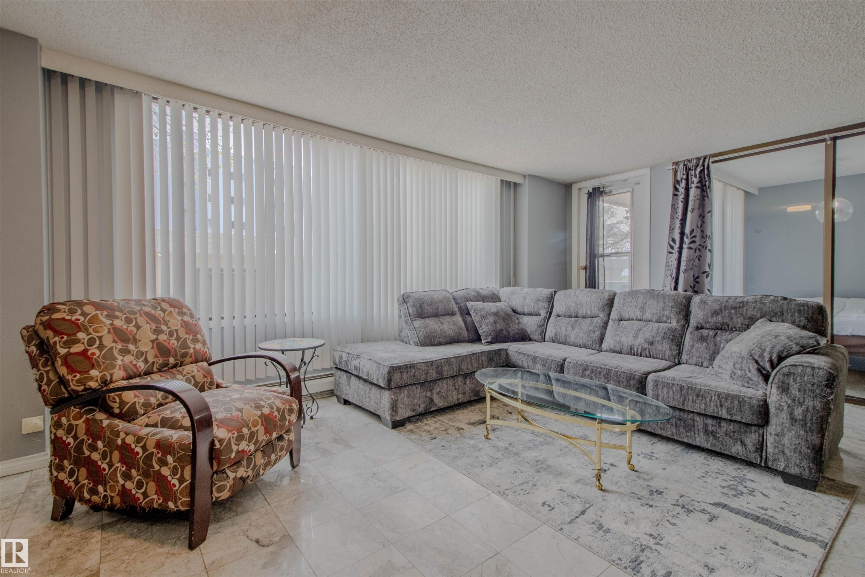 202 8340 Jasper Avenue, Edmonton, AB - Indoor Photo Showing Living Room