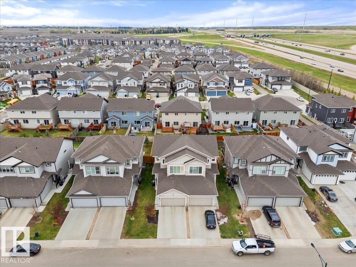 Aerial view of a residential community featuring multiple detached homes with varying architectural styles - 236 39 Avenue, Edmonton, AB - Outdoor With View