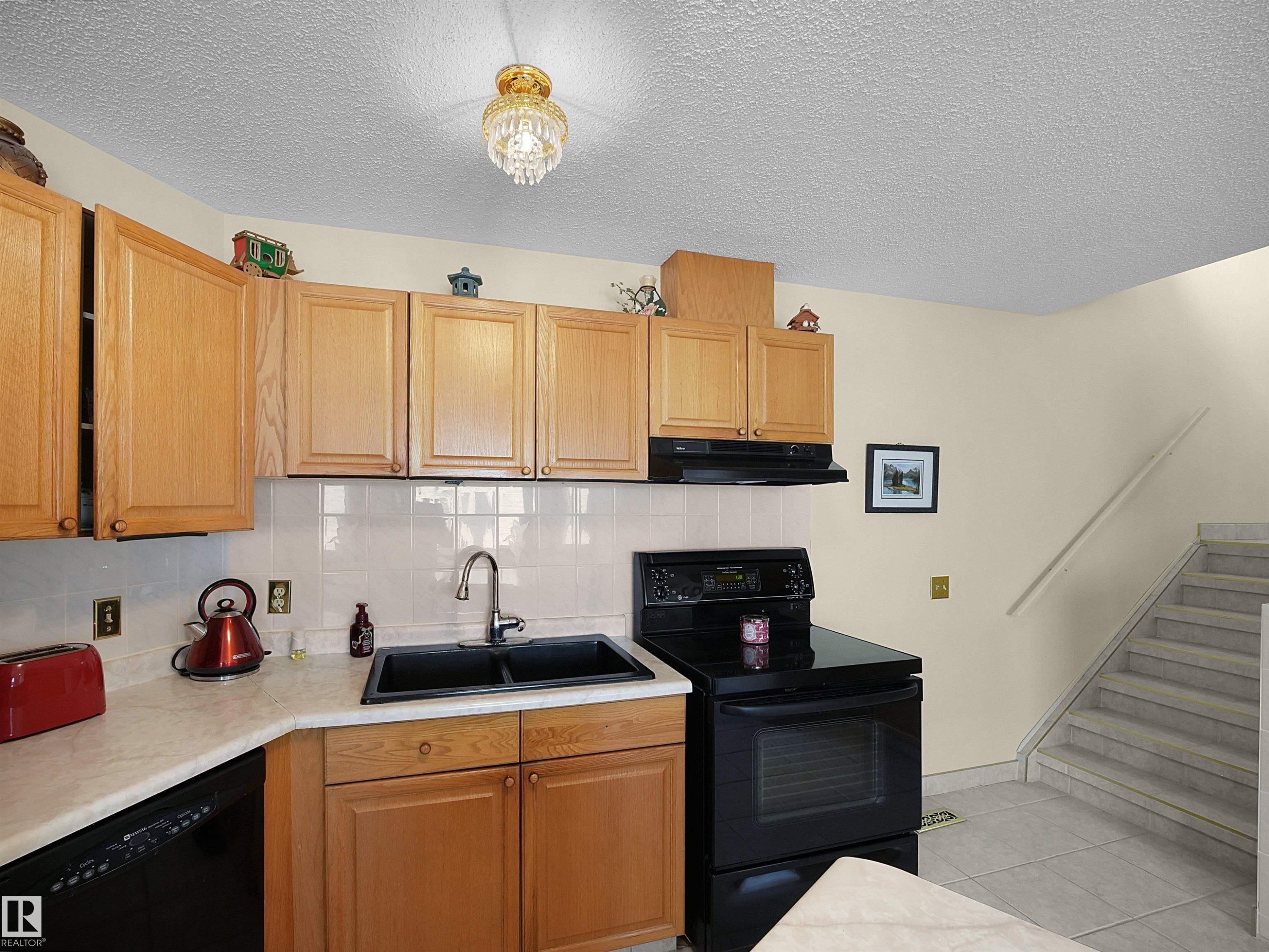10711 24 Avenue, Edmonton, AB - Indoor Photo Showing Kitchen With Double Sink