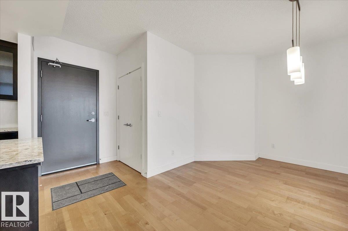 DINING AREA IN THE OPEN FLOOR PLAN - 503 10028 119 Street, Edmonton, AB - Indoor Photo Showing Other Room