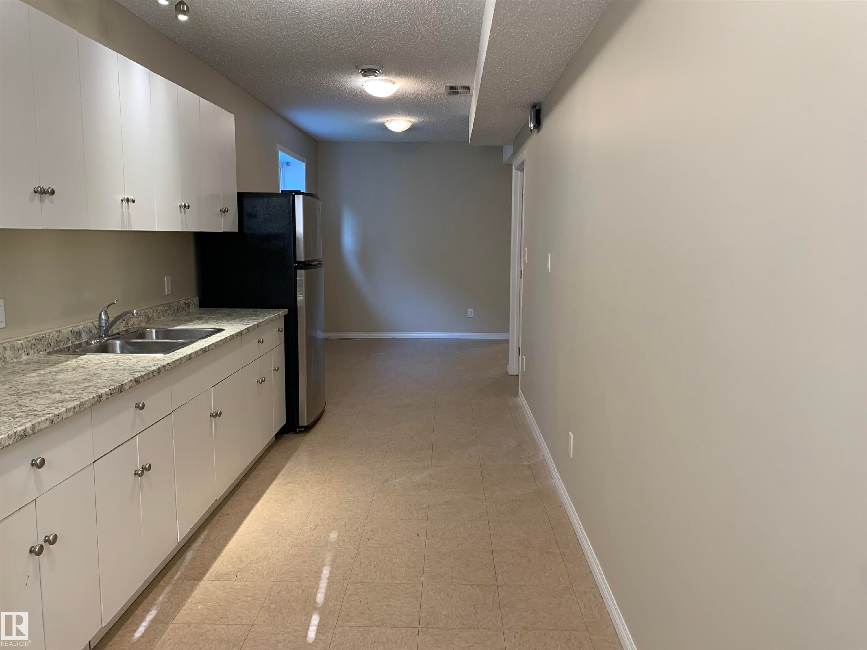 11824 93 Street, Edmonton, AB - Indoor Photo Showing Kitchen With Double Sink