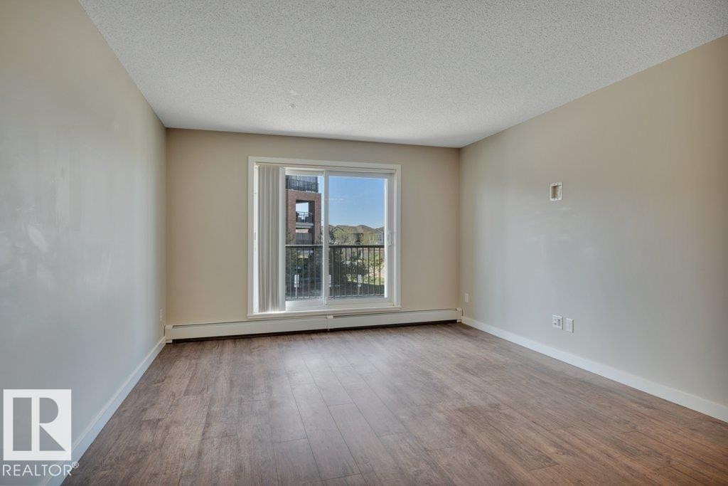 206 5510 Schonsee Drive, Edmonton, AB - Indoor Photo Showing Other Room