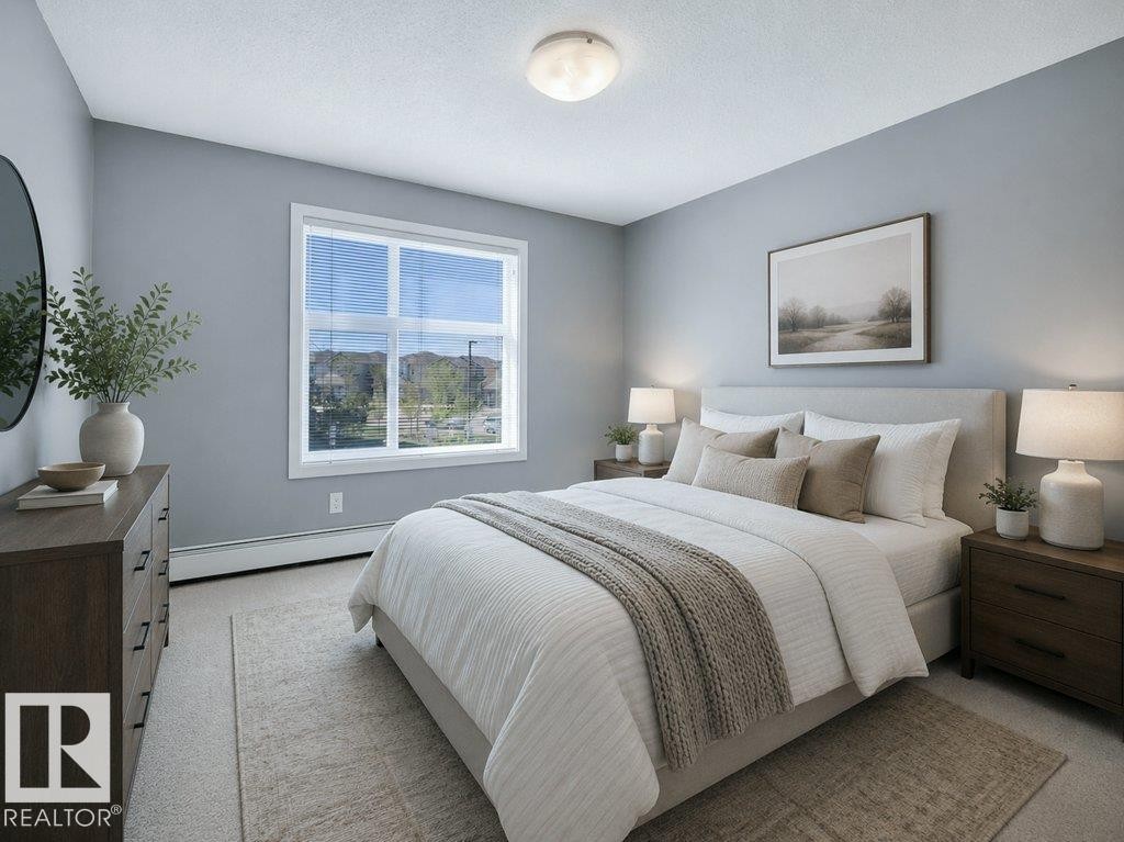 206 5510 Schonsee Drive, Edmonton, AB - Indoor Photo Showing Bedroom