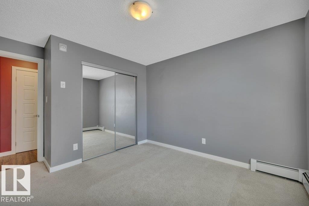 206 5510 Schonsee Drive, Edmonton, AB - Indoor Photo Showing Other Room