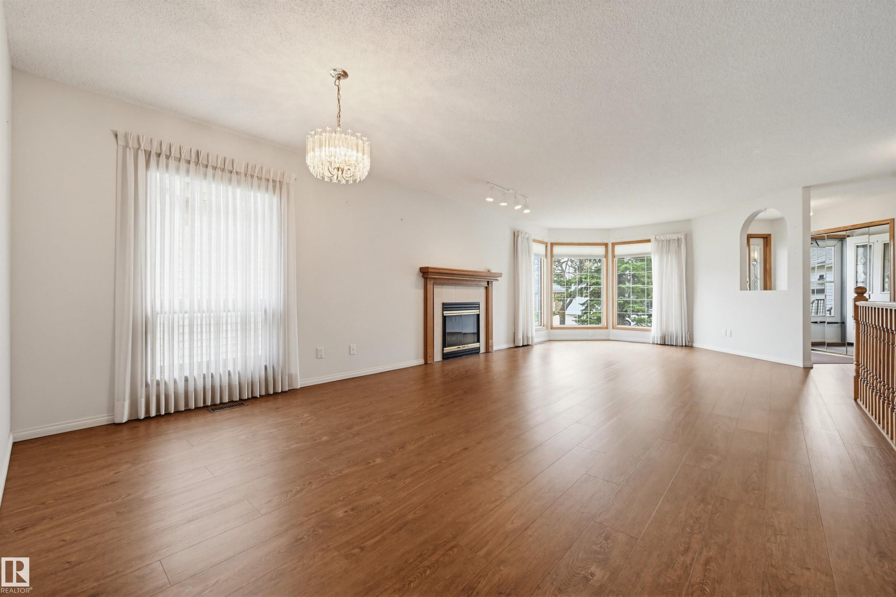 604 Revell Wynd, Edmonton, AB - Indoor Photo Showing Living Room With Fireplace