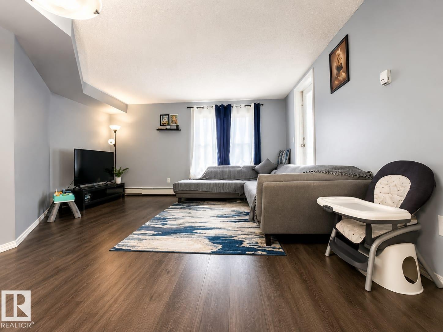#122 270 Mcconachie Dr Nw, Edmonton, AB - Indoor Photo Showing Living Room