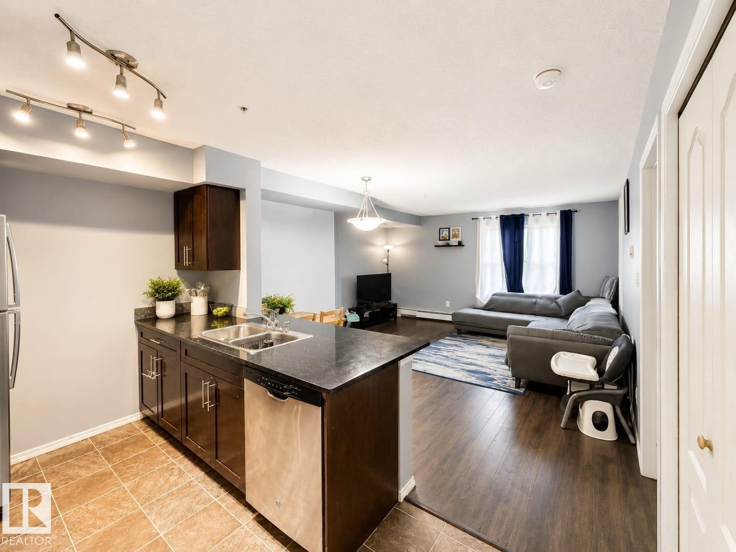 #122 270 Mcconachie Dr Nw, Edmonton, AB - Indoor Photo Showing Kitchen With Double Sink