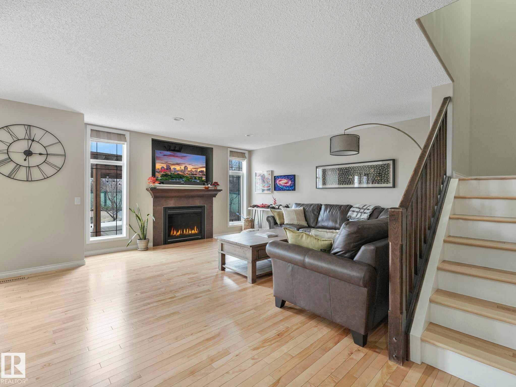 20853 92A Avenue Nw, Edmonton, AB - Indoor Photo Showing Living Room With Fireplace