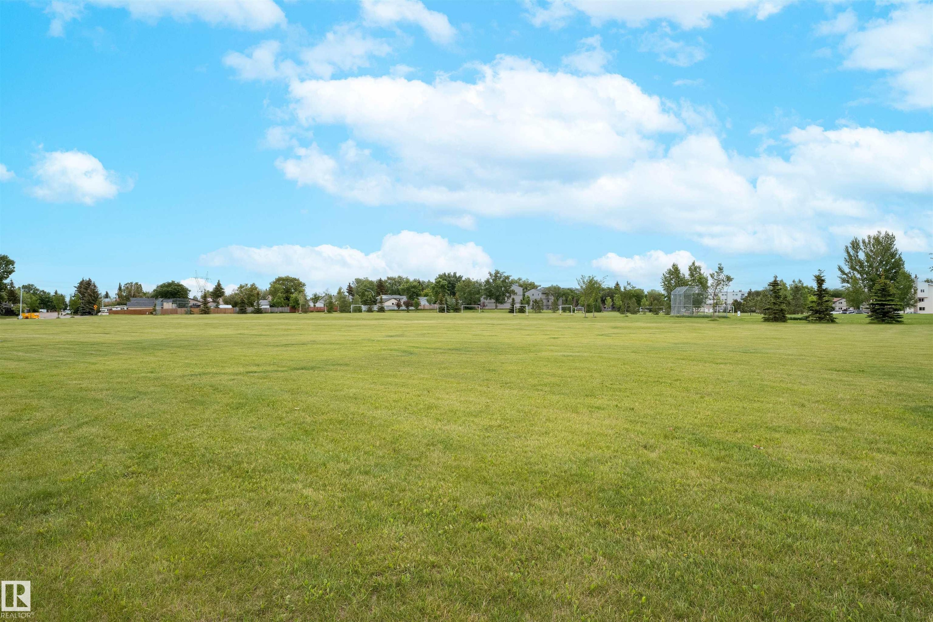 Enjoy the parks, soccer and sports fields and the play grounds nearby. - 11436 161 Avenue, Edmonton, AB - Outdoor With View