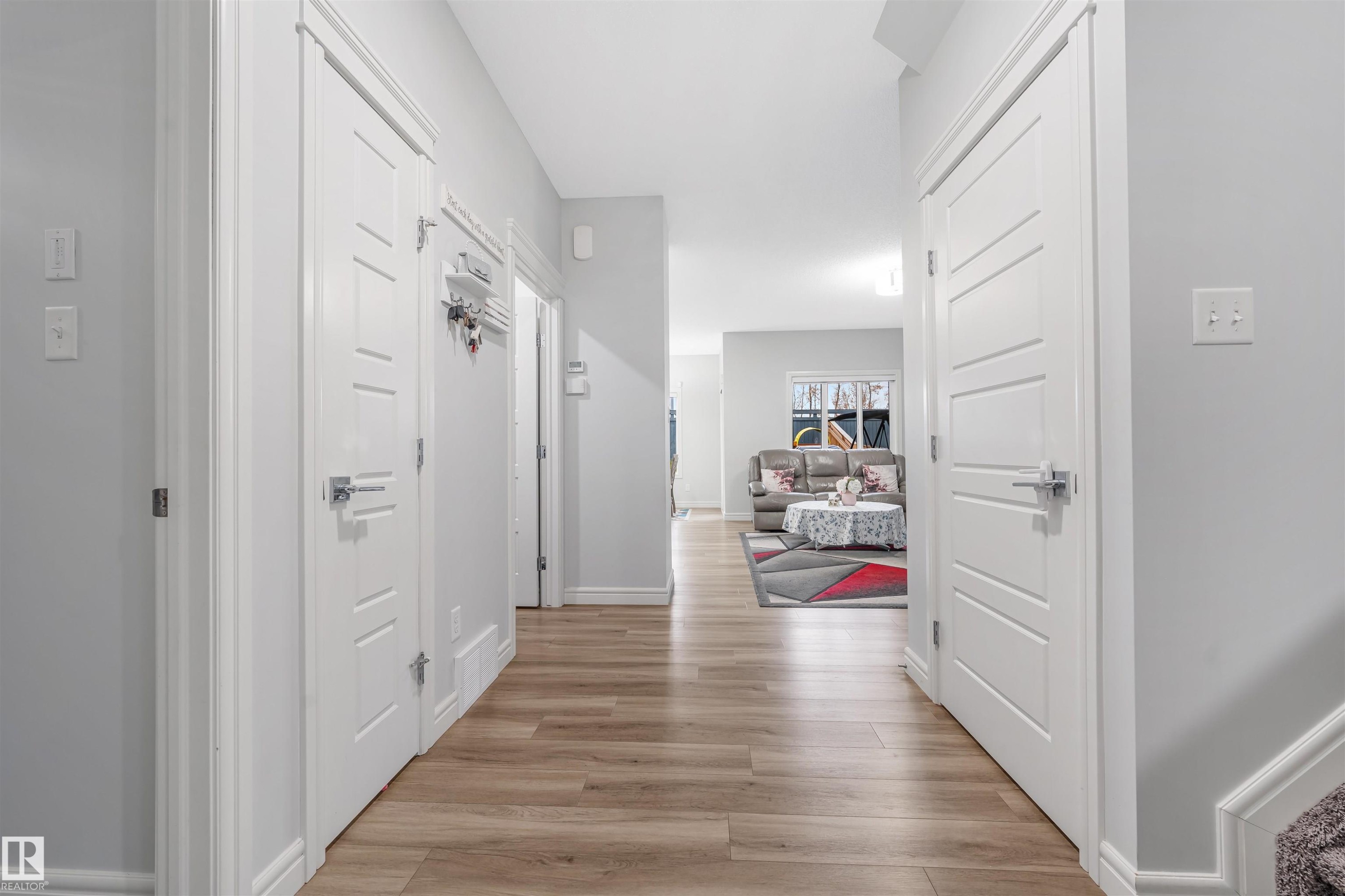 Entryway featuring light wood-finish flooring and neutral wall tones - 1024 Daniels Loop, Edmonton, AB - Indoor Photo Showing Other Room