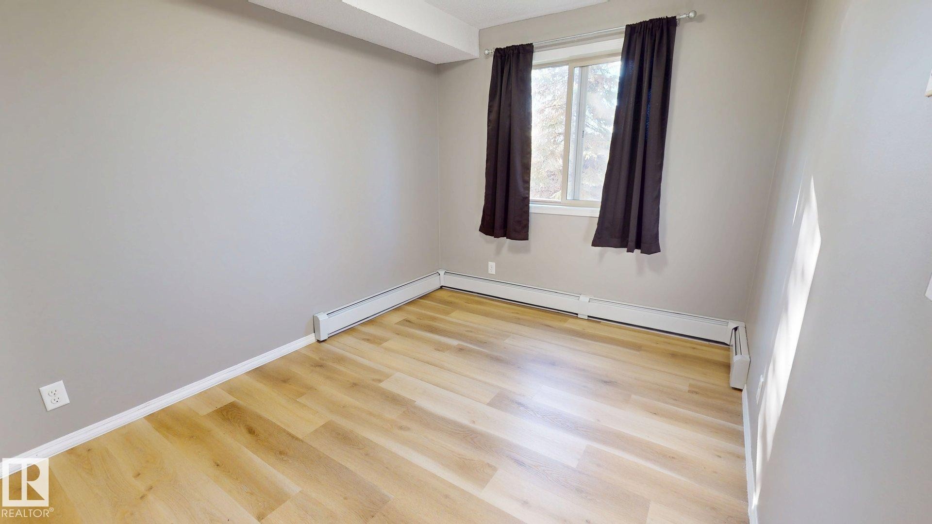 116 11808 22 Avenue Sw, Edmonton, AB - Indoor Photo Showing Other Room