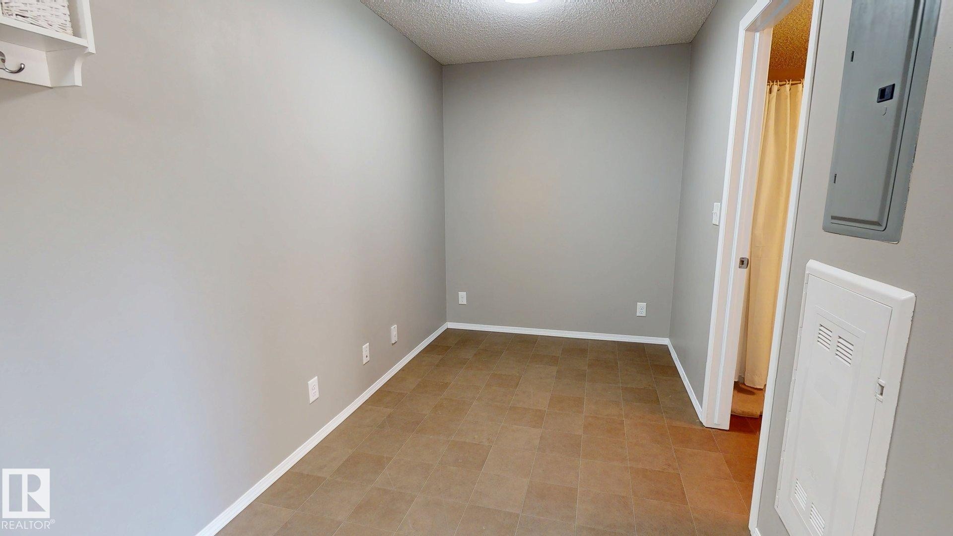 116 11808 22 Avenue Sw, Edmonton, AB - Indoor Photo Showing Other Room
