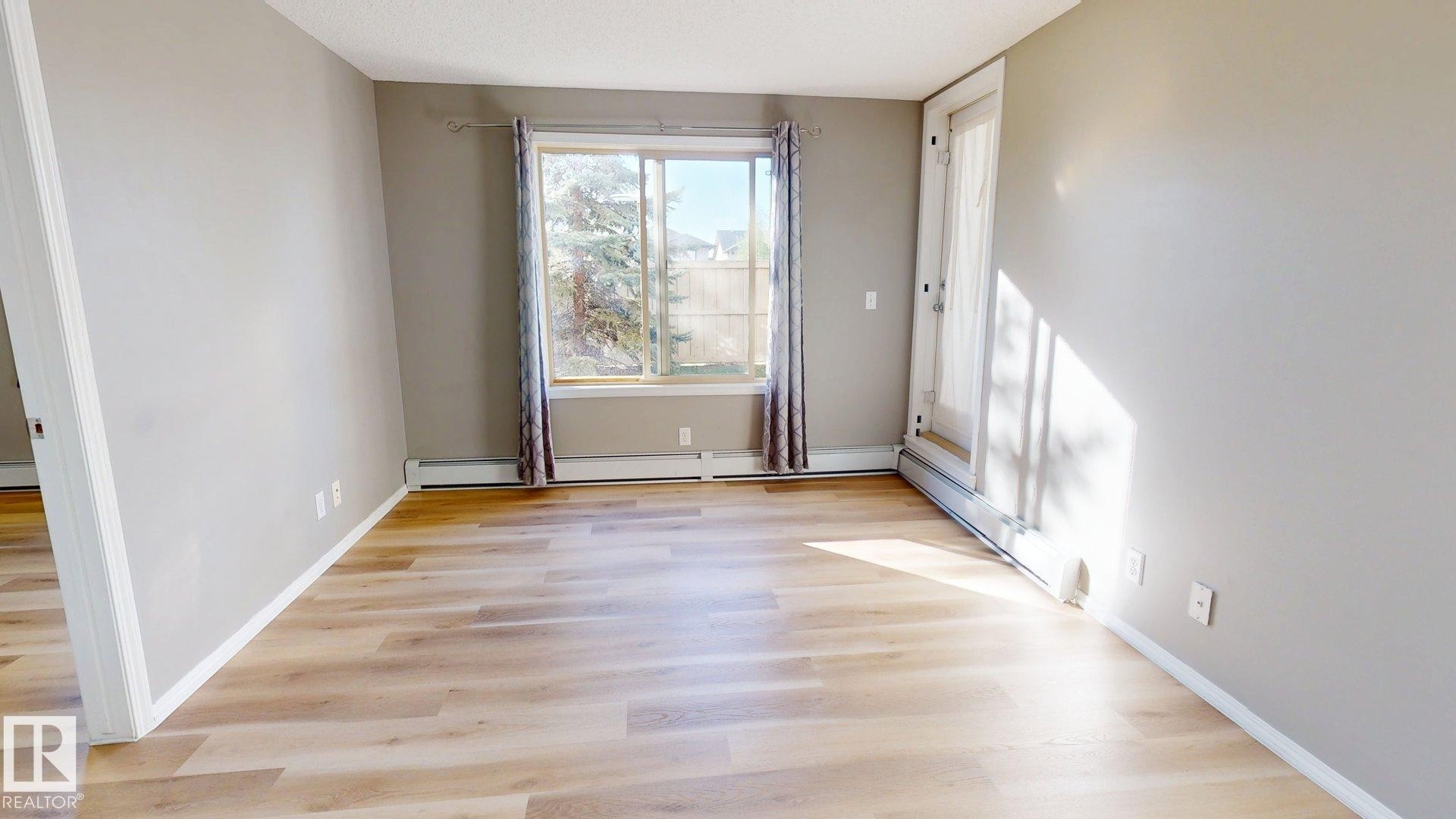 116 11808 22 Avenue Sw, Edmonton, AB - Indoor Photo Showing Other Room
