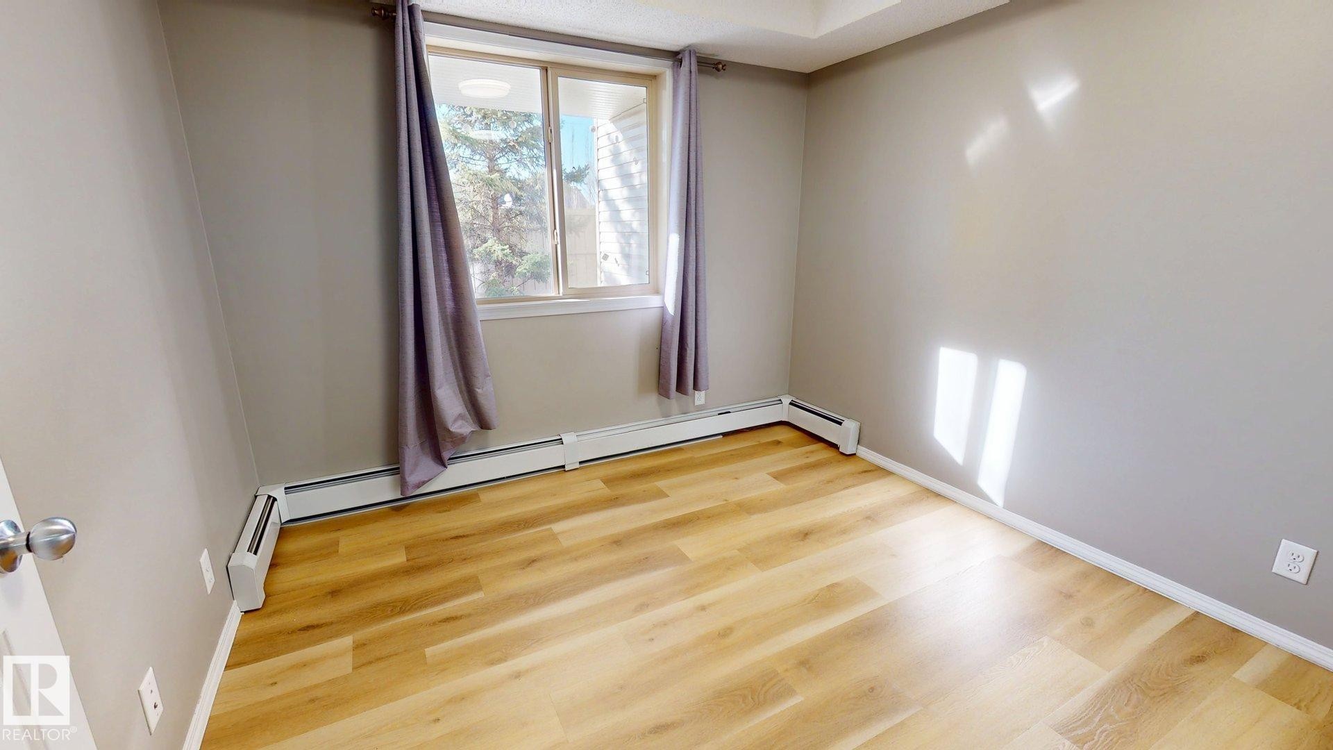 116 11808 22 Avenue Sw, Edmonton, AB - Indoor Photo Showing Other Room