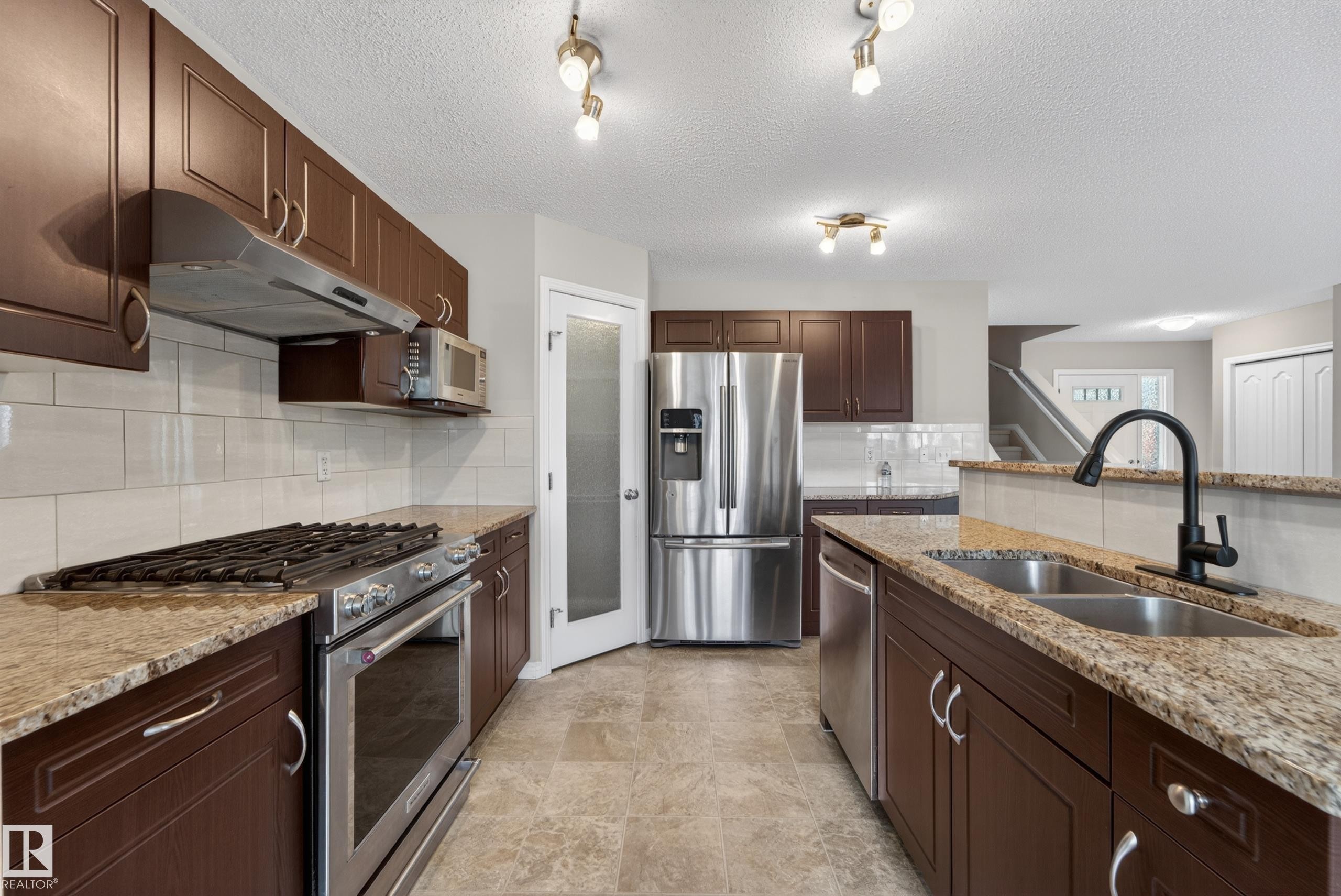 1731 55 Street, Edmonton, AB - Indoor Photo Showing Kitchen With Stainless Steel Kitchen With Double Sink