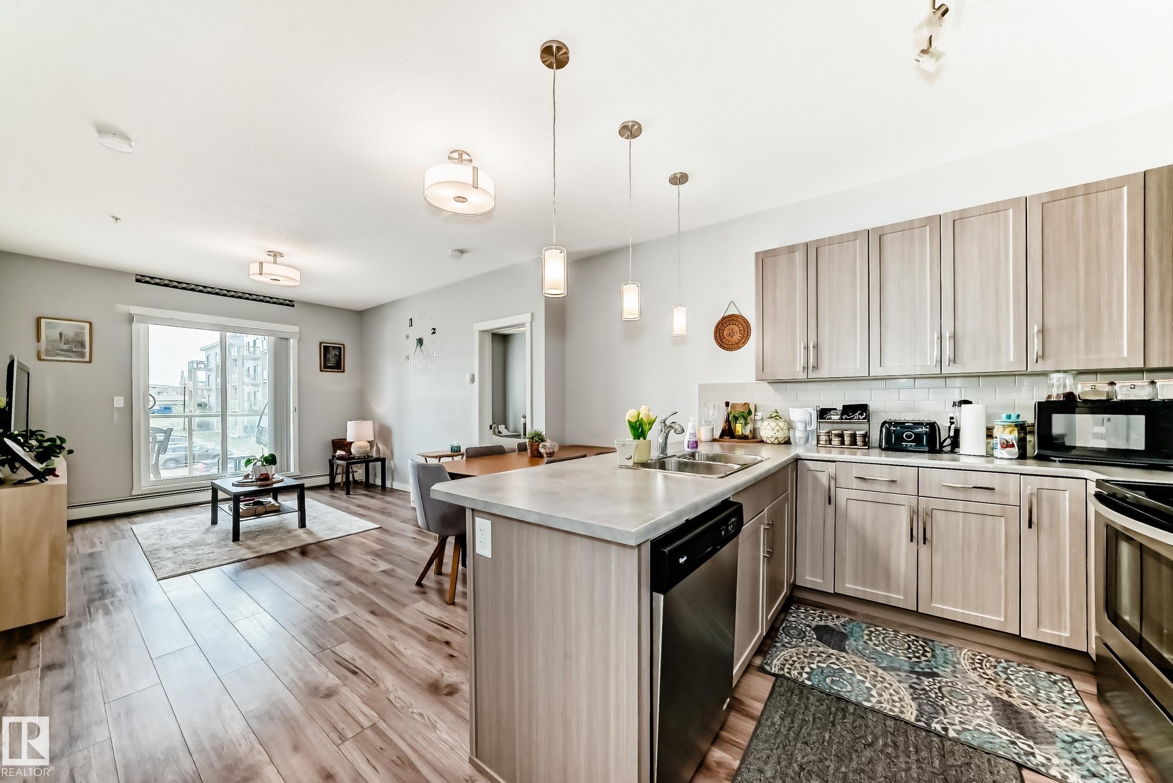 208 812 Welsh Drive, Edmonton, AB - Indoor Photo Showing Kitchen With Stainless Steel Kitchen With Double Sink