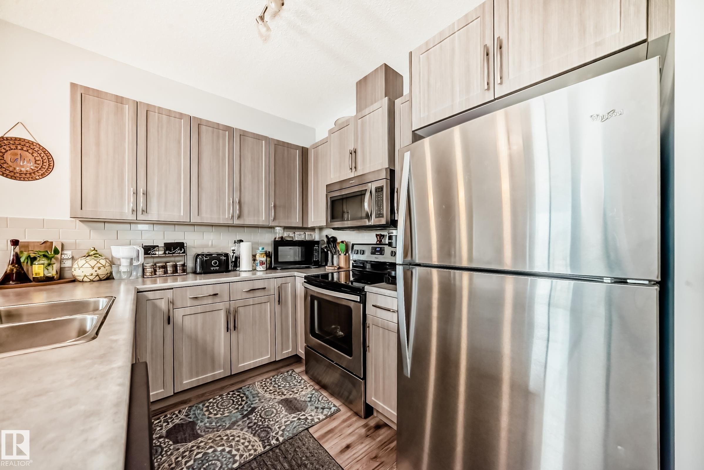 208 812 Welsh Drive, Edmonton, AB - Indoor Photo Showing Kitchen With Stainless Steel Kitchen With Double Sink