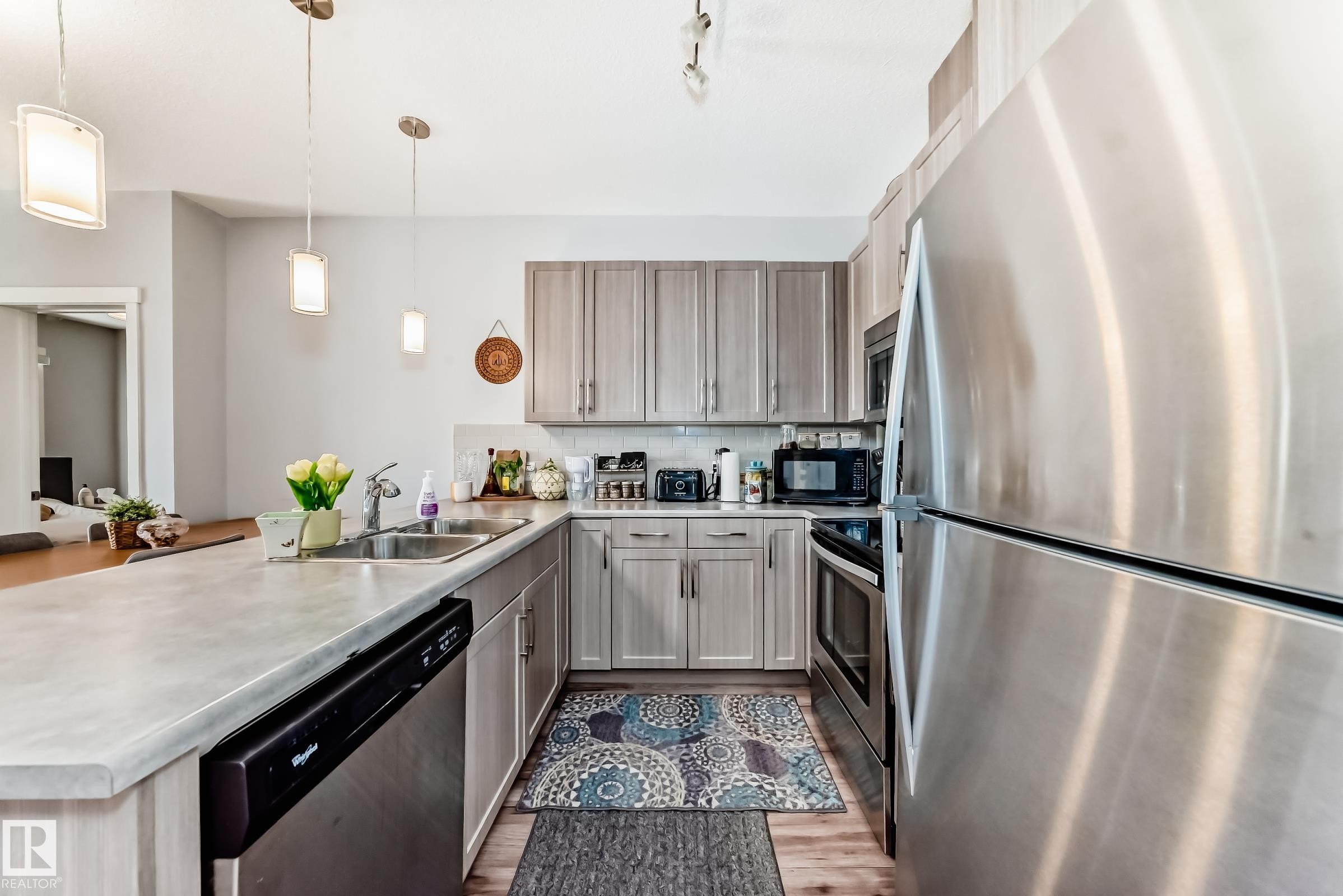 208 812 Welsh Drive, Edmonton, AB - Indoor Photo Showing Kitchen With Stainless Steel Kitchen With Double Sink