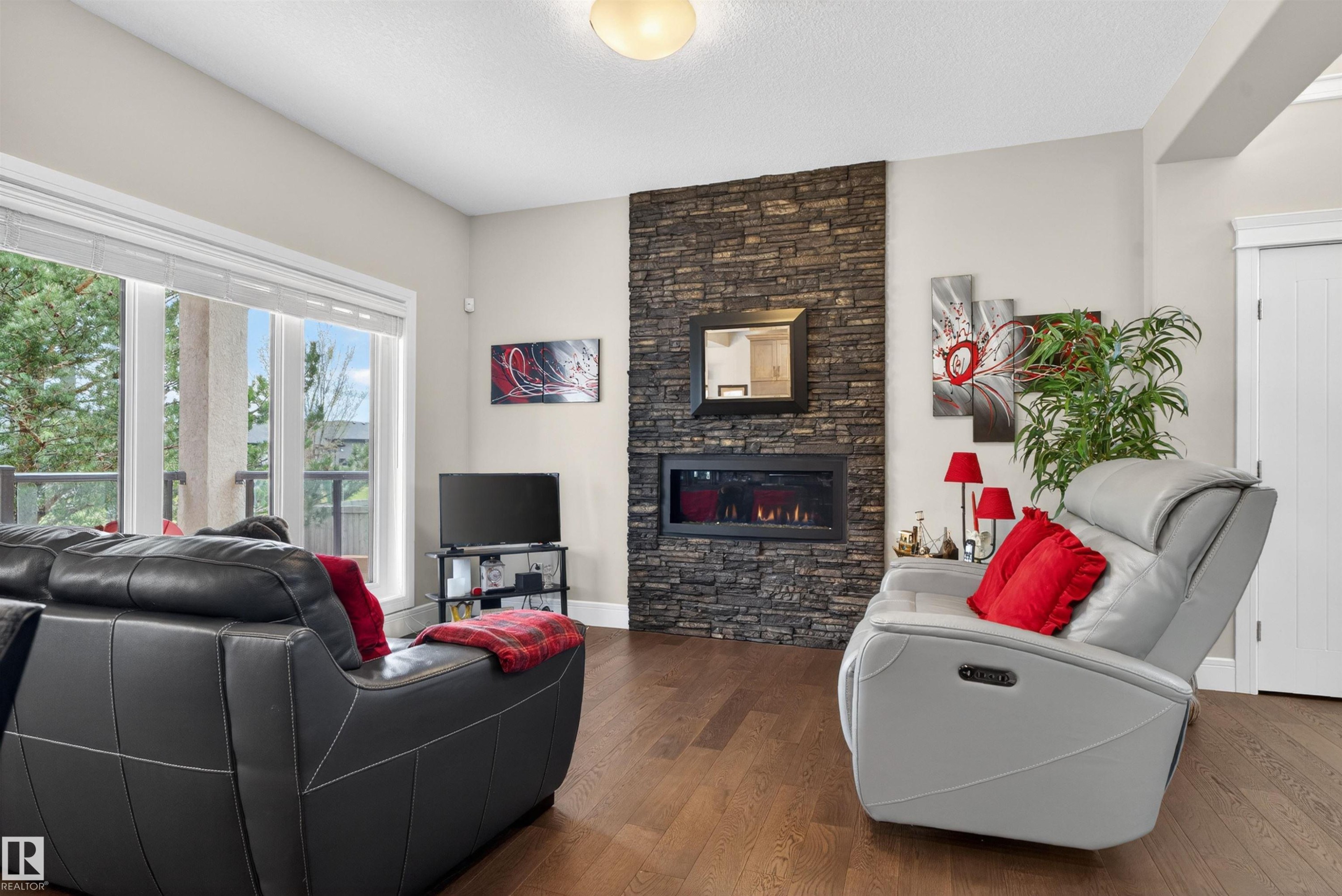 1 1030 Connelly Way, Edmonton, AB - Indoor Photo Showing Living Room With Fireplace