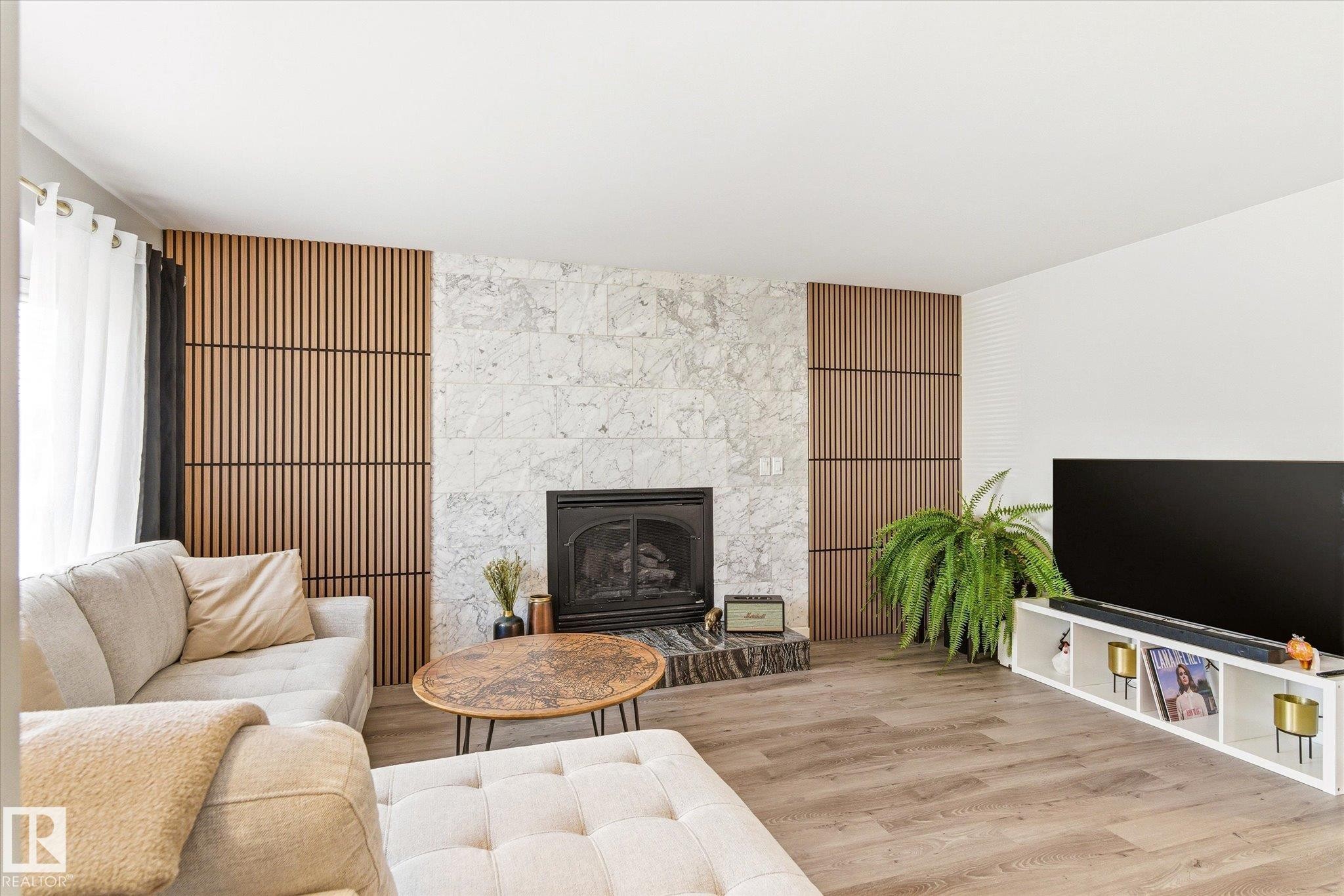 67 Arlington Drive, St. Albert, AB - Indoor Photo Showing Living Room With Fireplace