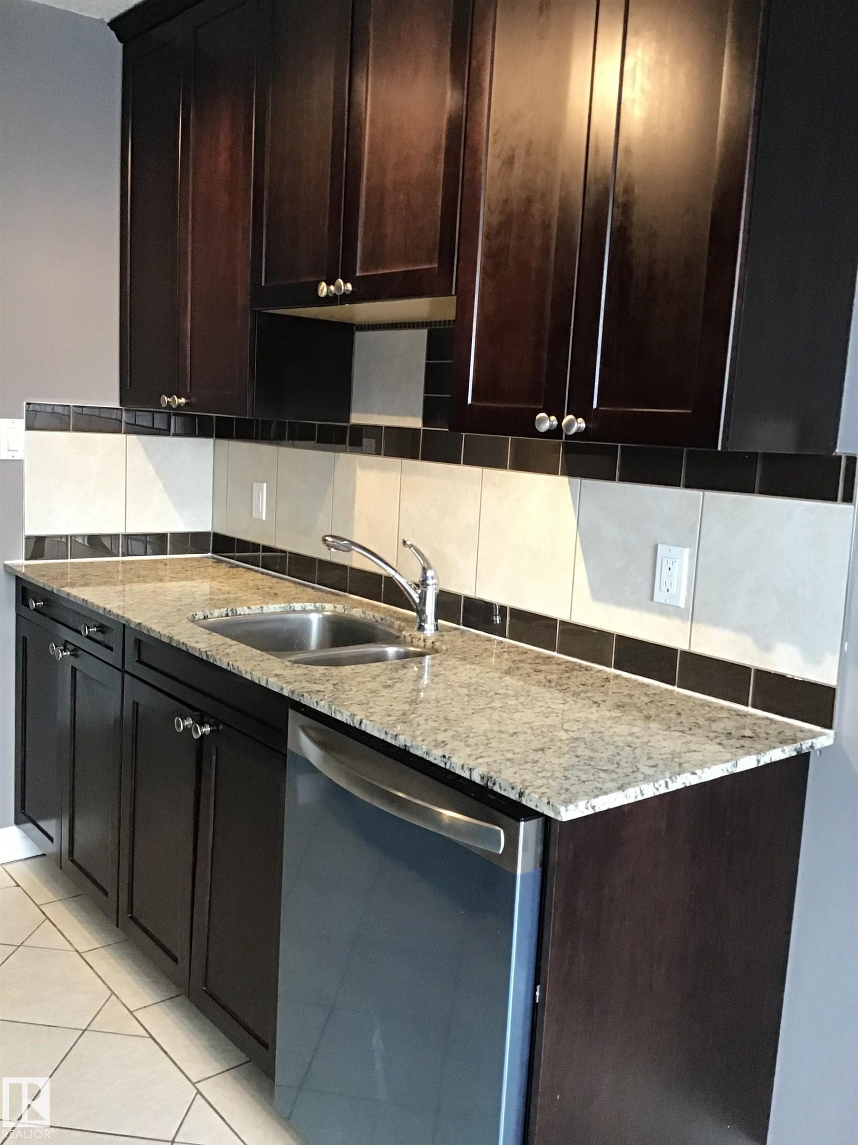 402 10625 83 Avenue, Edmonton, AB - Indoor Photo Showing Kitchen With Double Sink