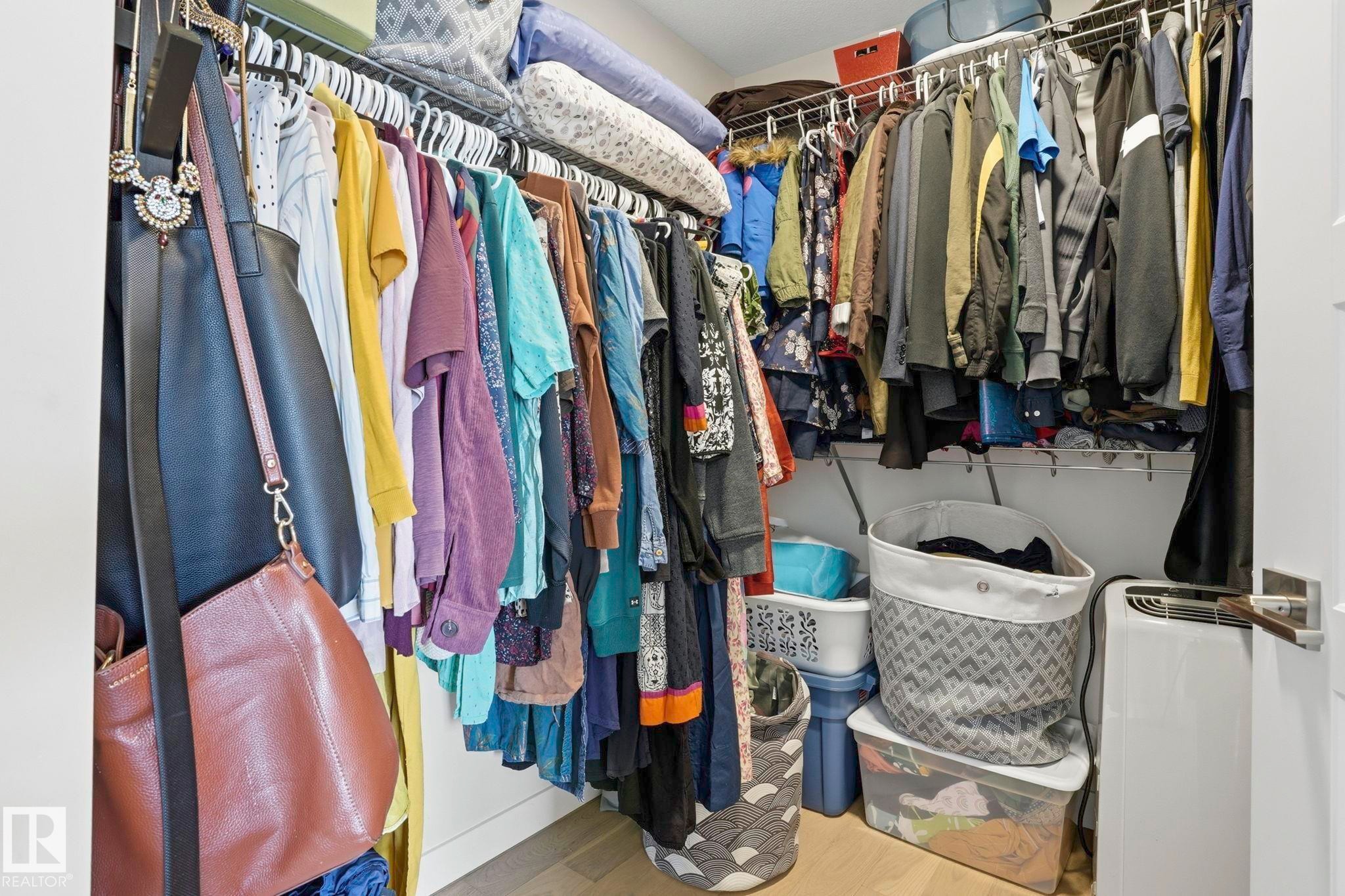 Walk-in closet with wire shelving and hanging rods - 2116 159 Street, Edmonton, AB - Indoor With Storage