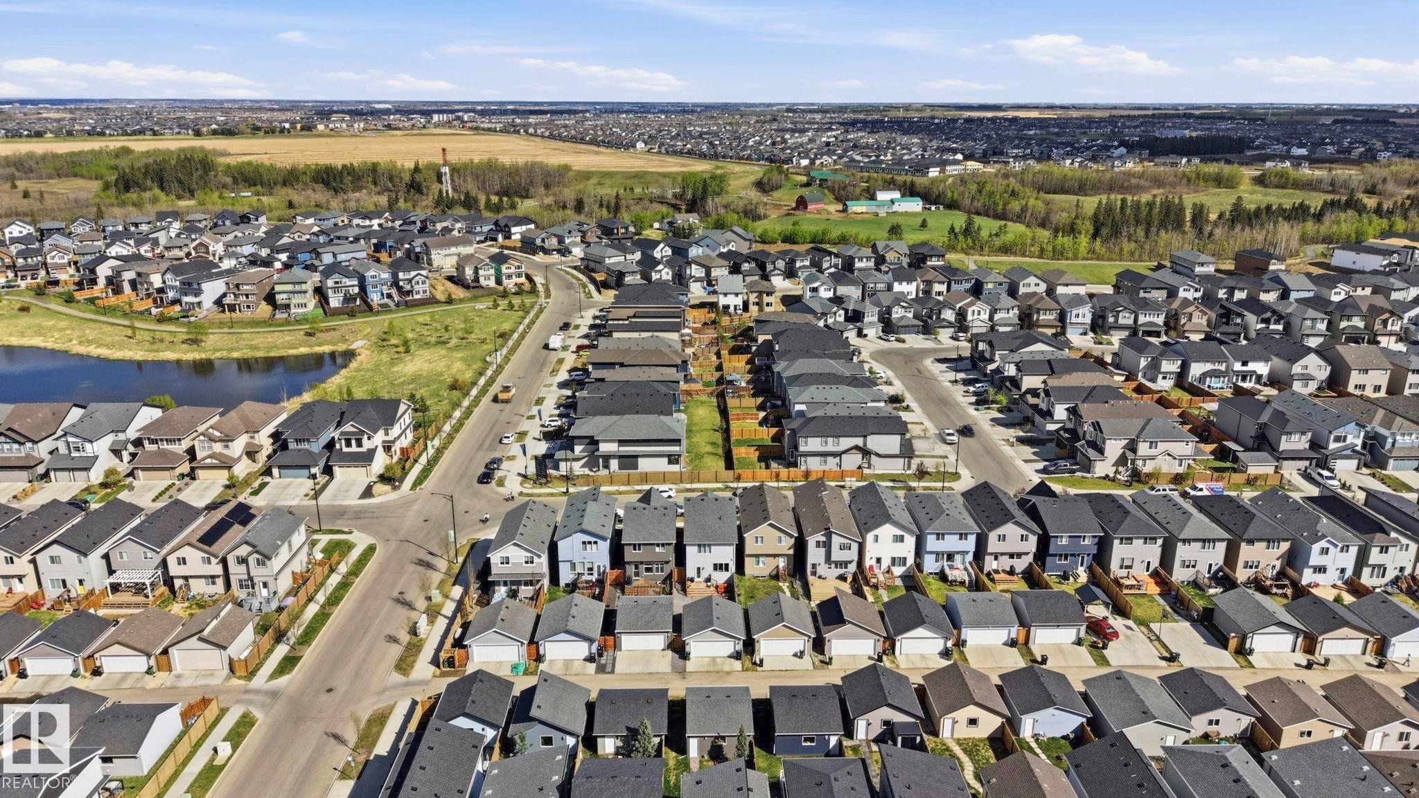 Developed residential area featuring a variety of detached homes with attached garages - 2116 159 Street, Edmonton, AB - Outdoor With View