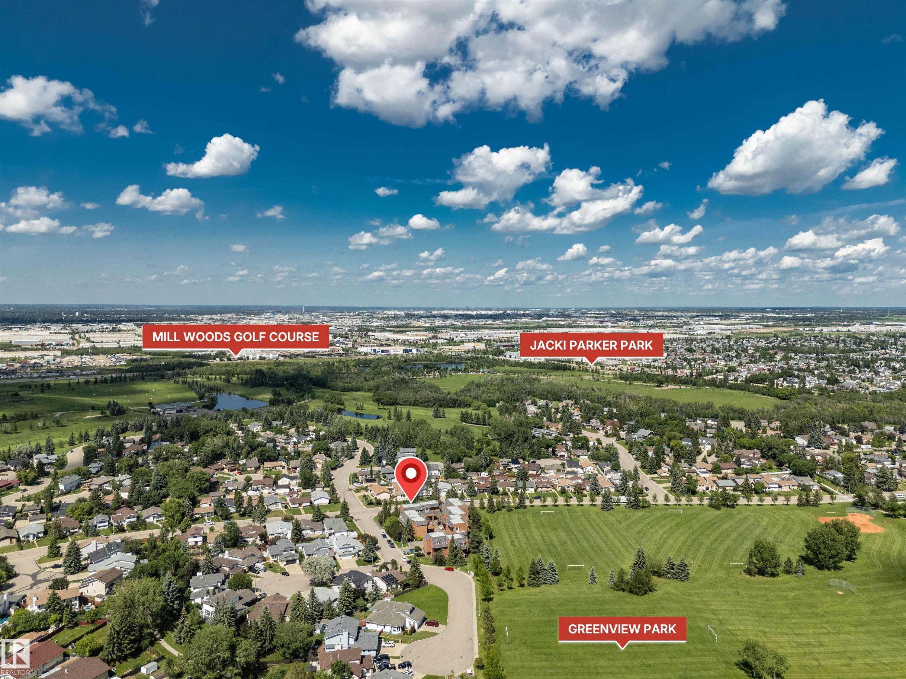 Aerial perspective showcasing the property's proximity to Mill Woods Golf Course, Jacki Parker Park, and Greenview Park - 5953 40 Avenue, Edmonton, AB