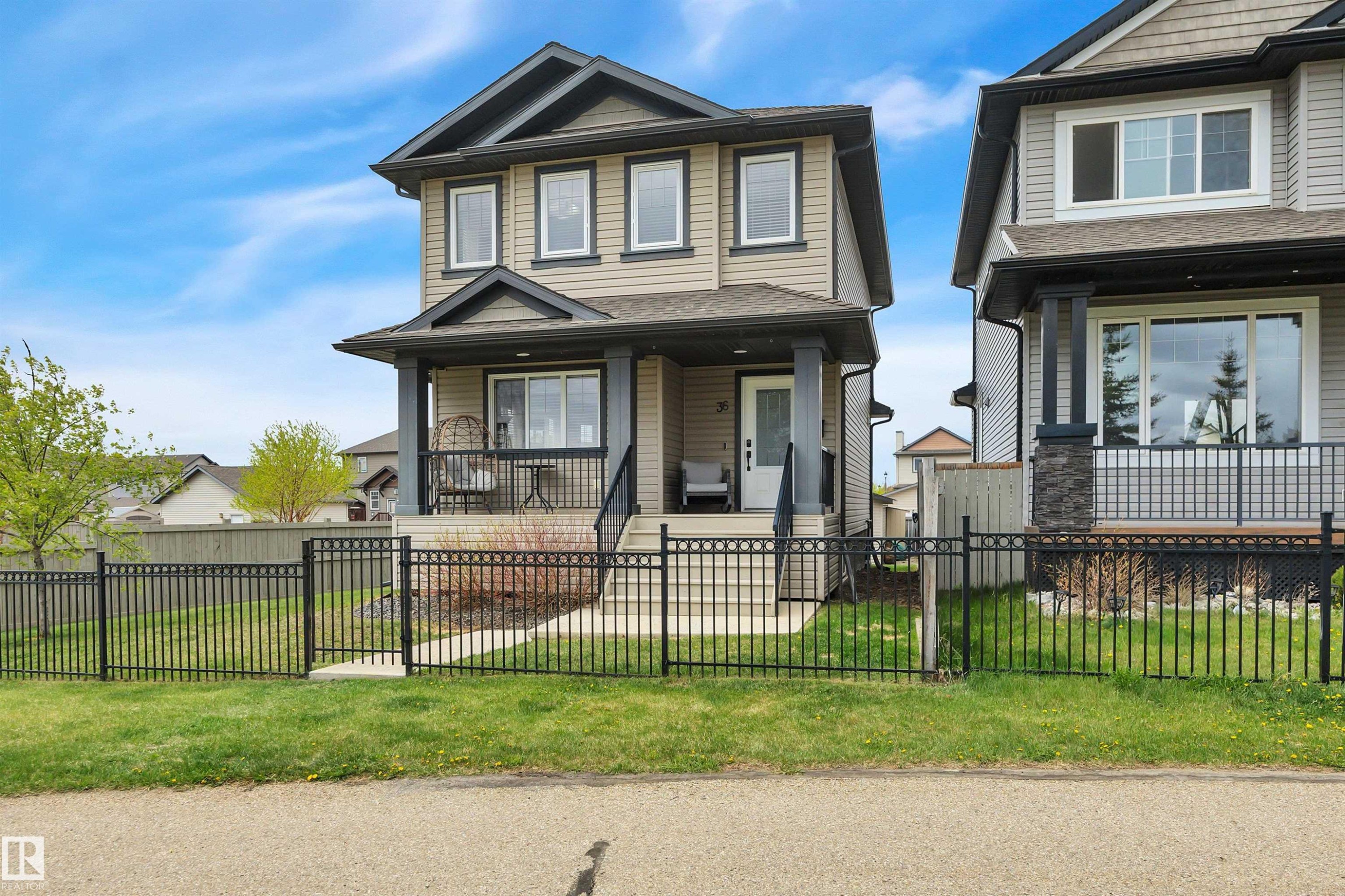 36 Spruce Boulevard, Leduc, AB - Outdoor With Deck Patio Veranda With Facade