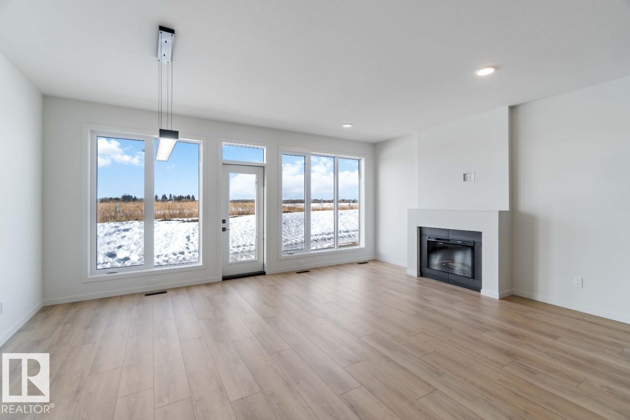 29 Devonshire Drive, Sherwood Park, AB - Indoor Photo Showing Living Room With Fireplace