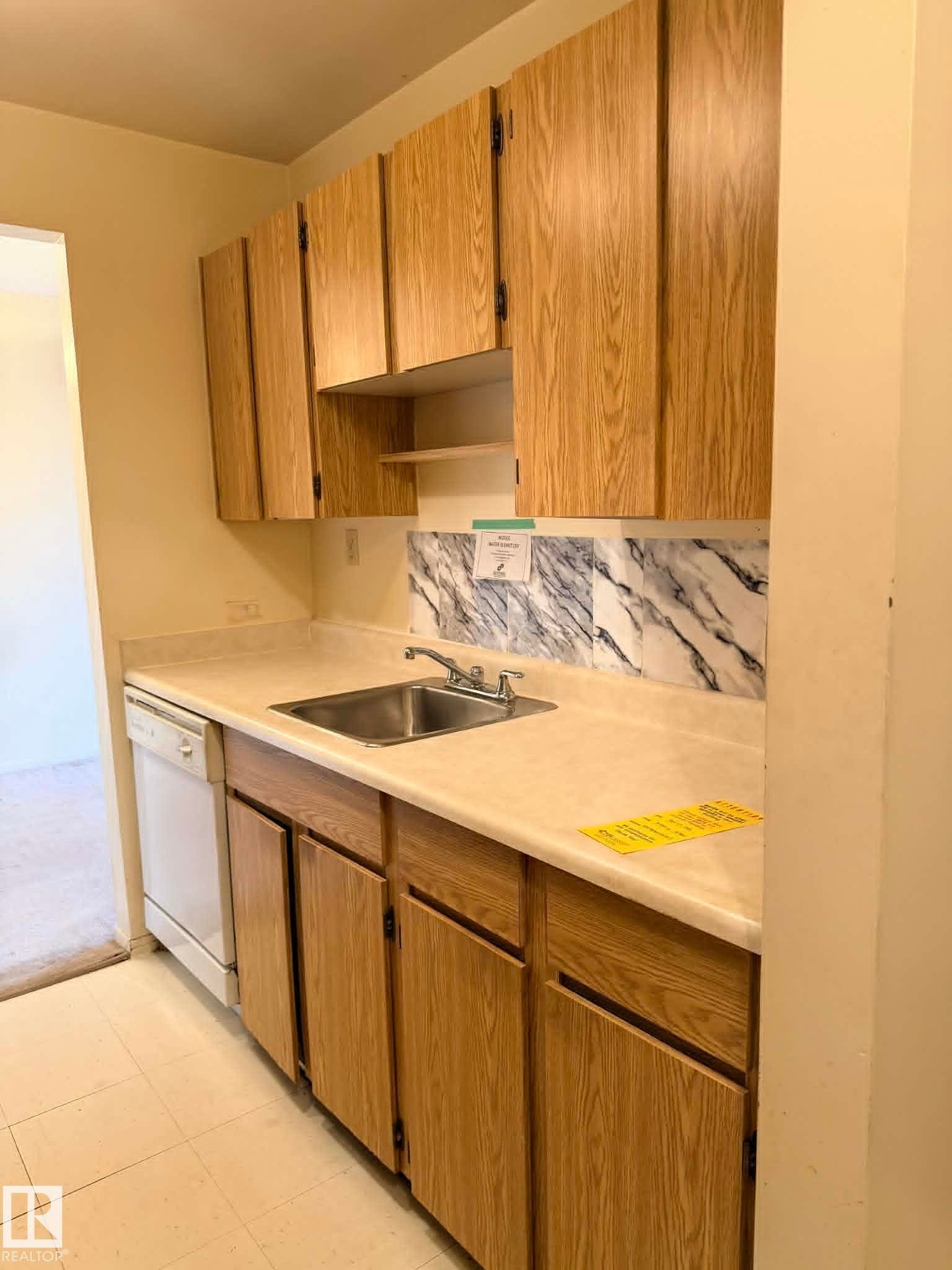 414 4810 Mill Woods Road S, Edmonton, AB - Indoor Photo Showing Kitchen