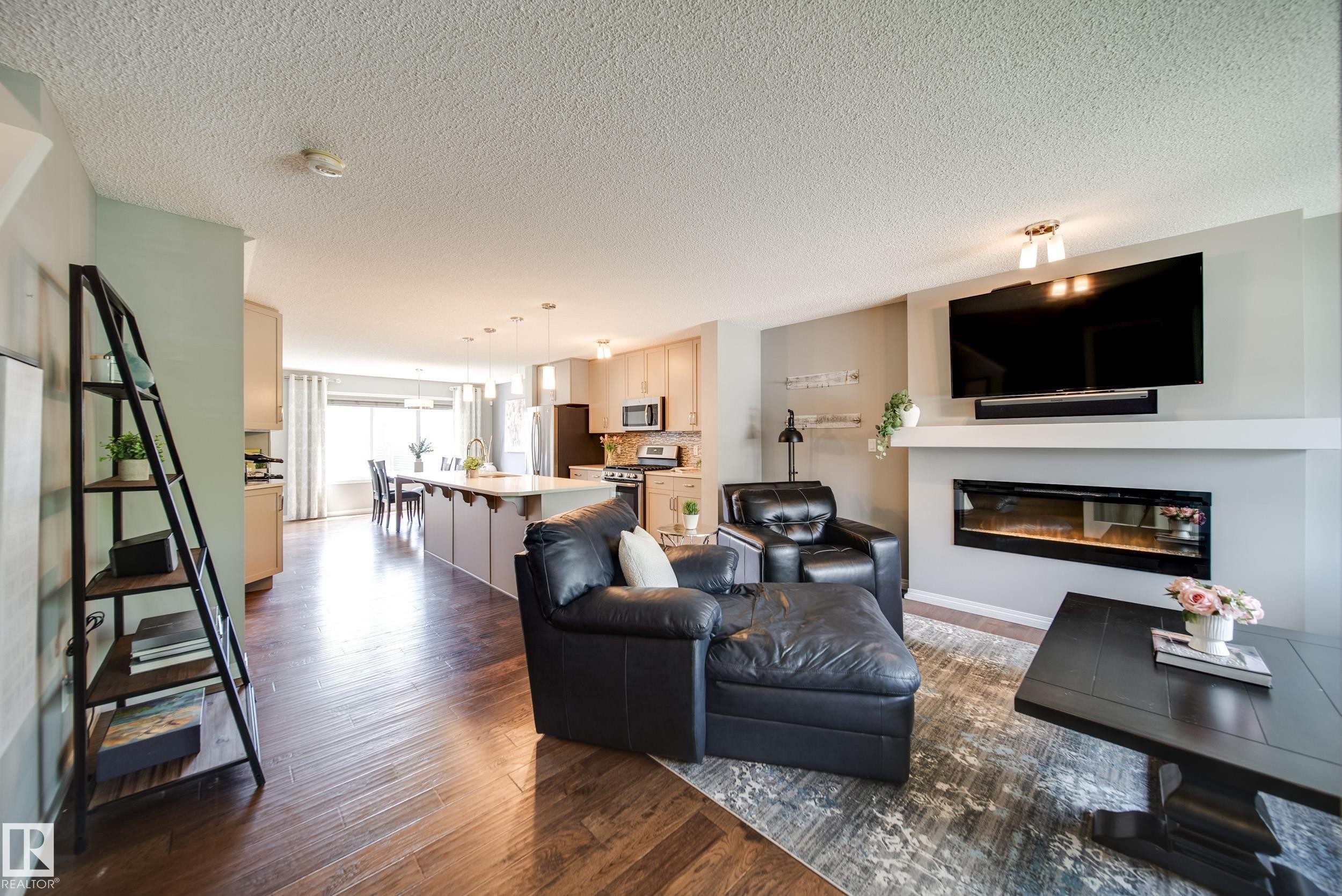 3365 Orchards Link, Edmonton, AB - Indoor Photo Showing Living Room With Fireplace
